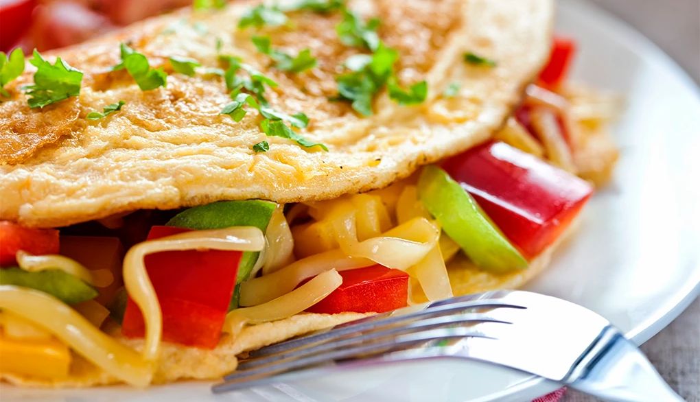 Good nutrition is essential to optimal brain function A close-up view of an omelette on a plate