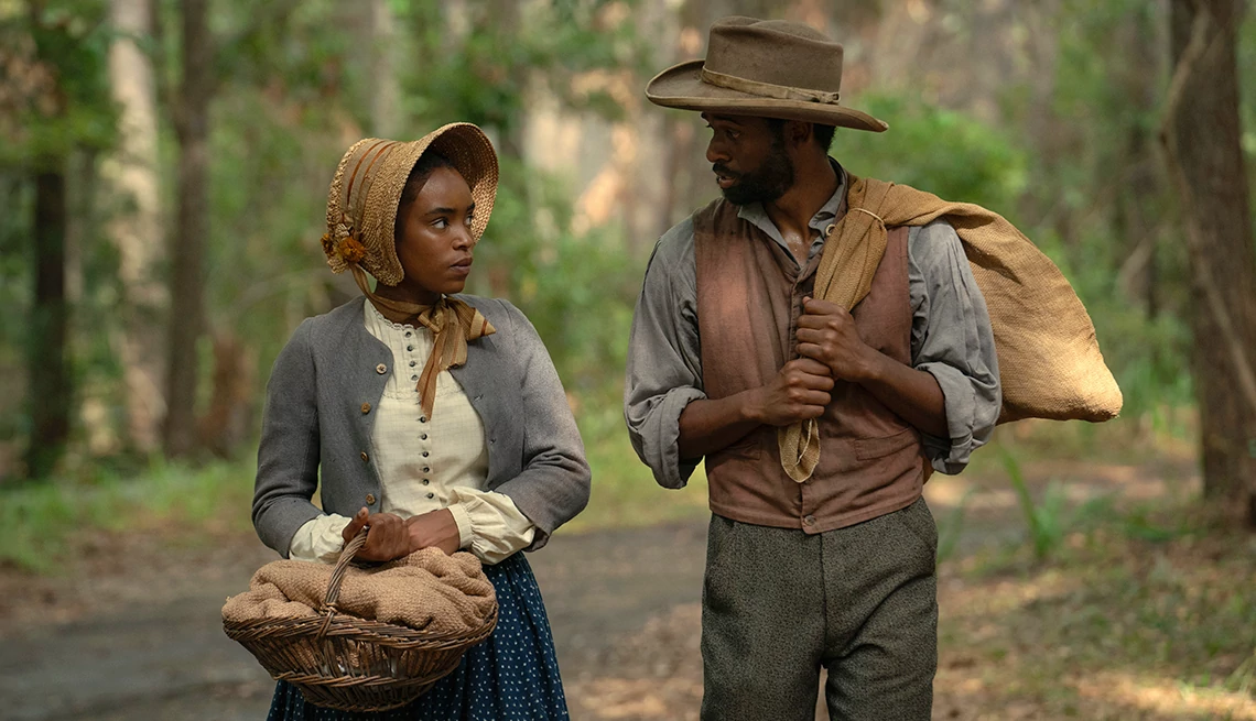 Lovie Simone and Antonio Bell walking next to each other in the Apple TV+ series "Manhunt" Lovie Simone and Antonio Bell walking next to each other in the Apple TV+ series "Manhunt"