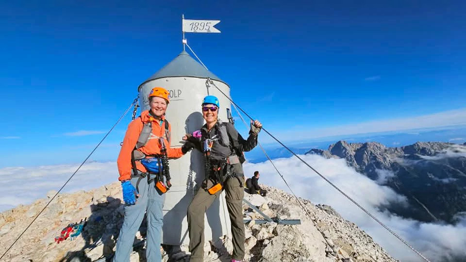 Kristy Burns and Annette Demel at the top of Mount Triglav, the highest peak in Slovenia, in August 2023