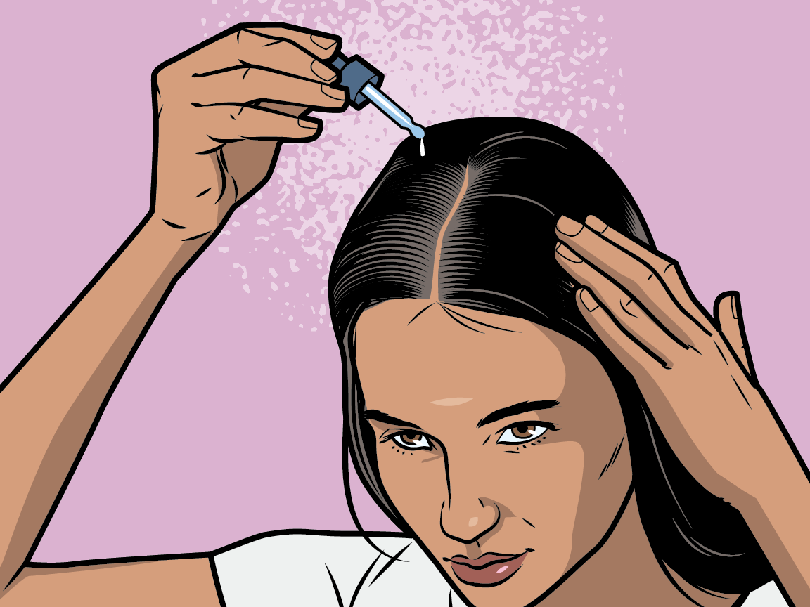 Applying vital drops, for healthy hair