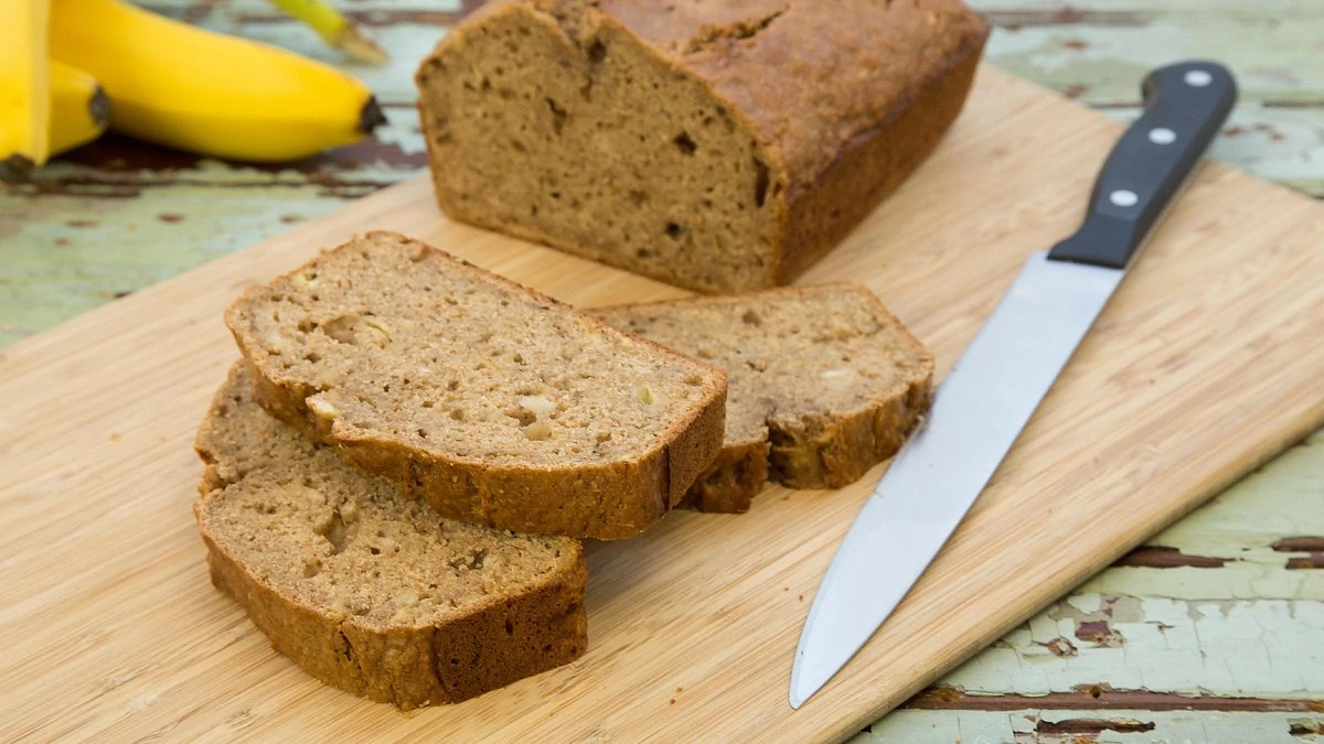 A close-up view of banana bread on a cutting board