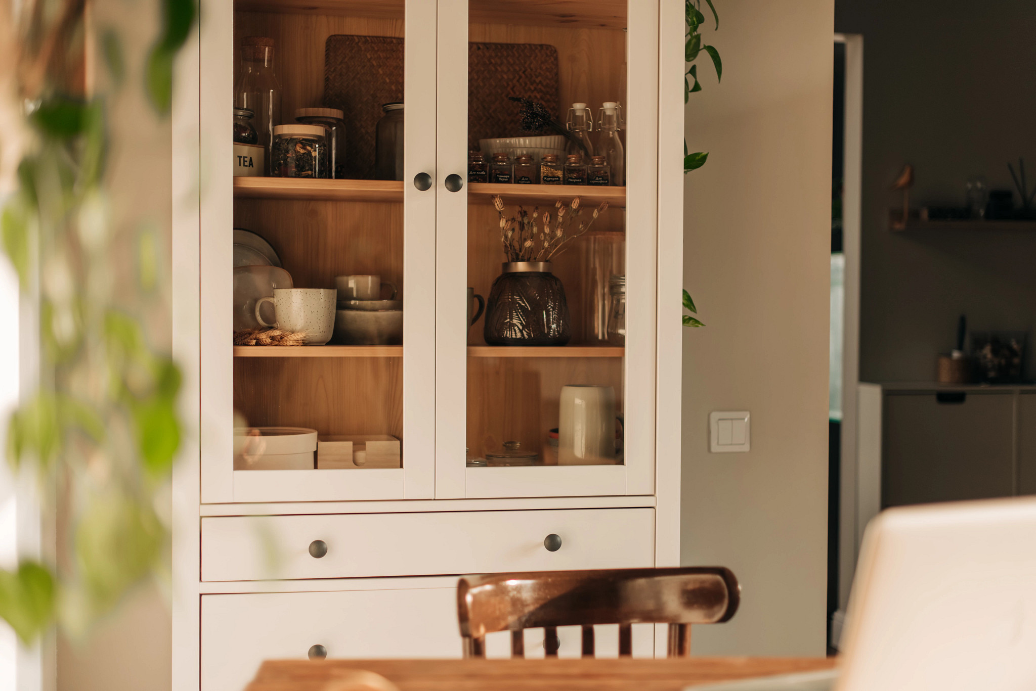 a photo shows a window cabinet in a kitchen