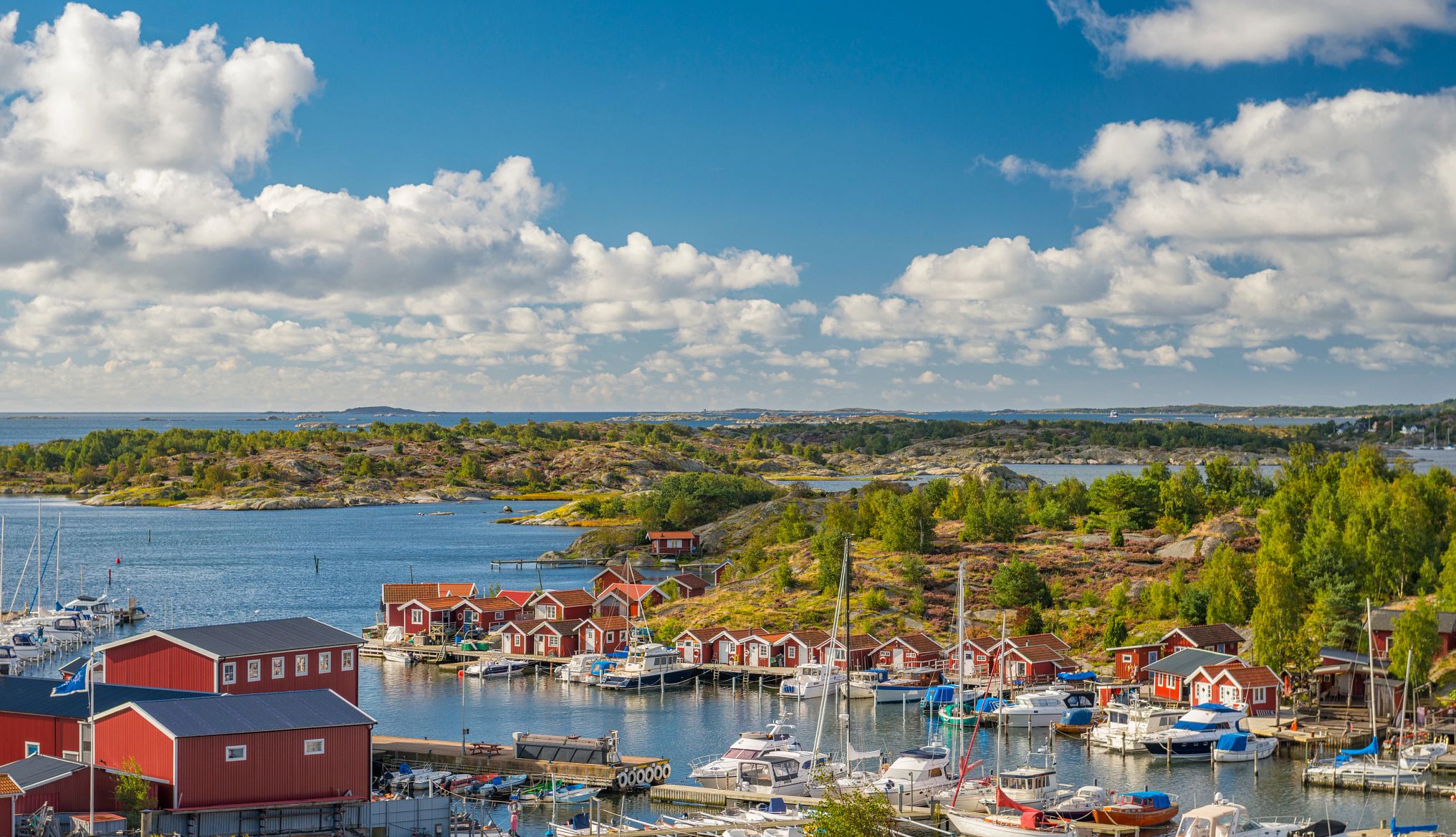 Göteborg Sweden homes near a pier filled with boats