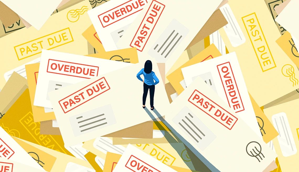 a spouse's death can impact your credit score a woman standing on oversized bils