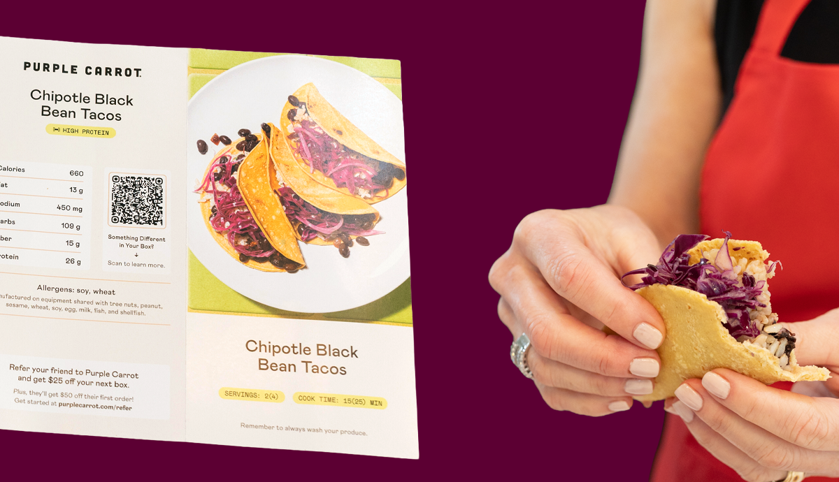 Packaged vegetables and other ingredients on a white counter alongside a plant, a white bowl and the hands of an adult