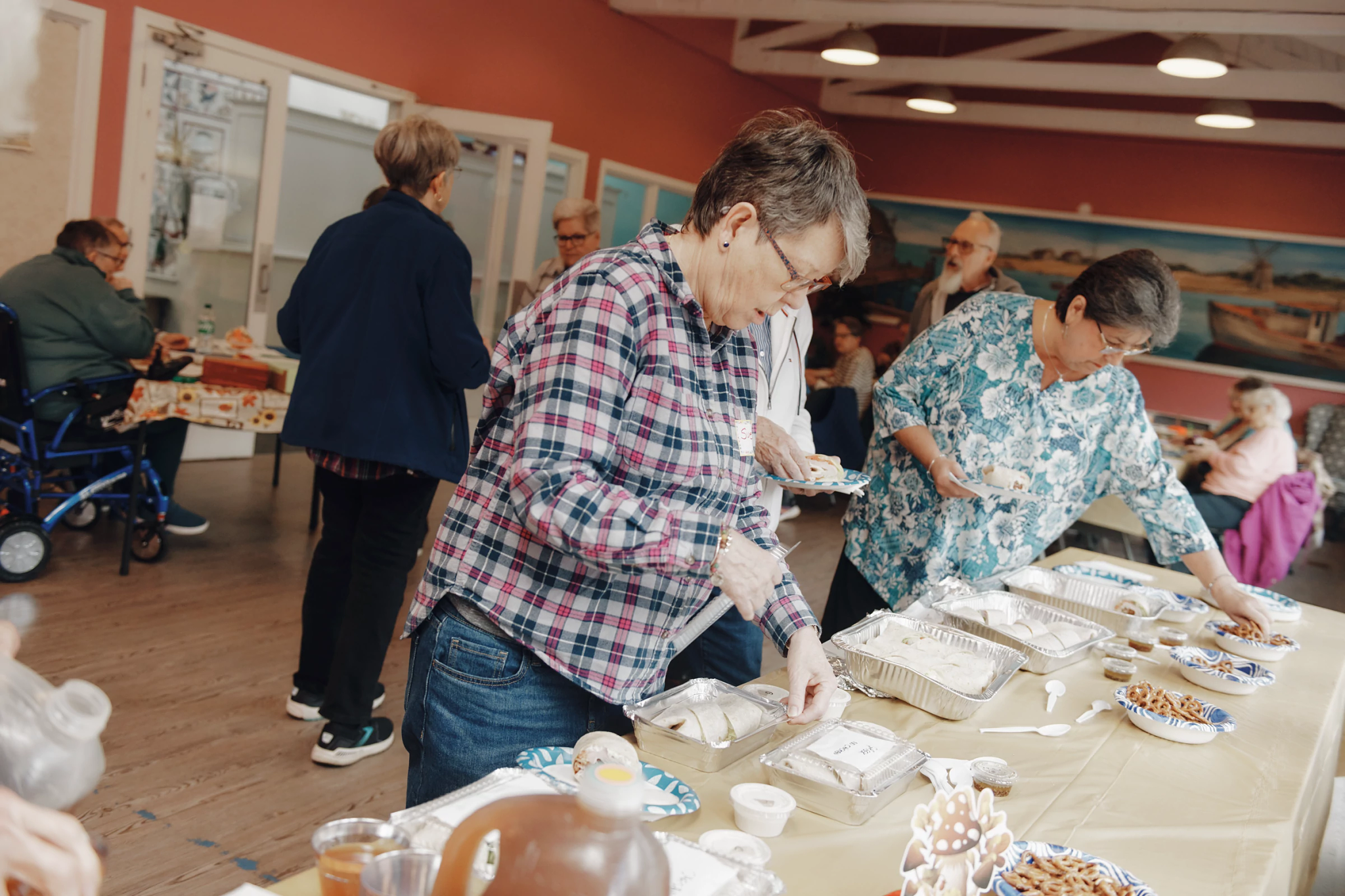 people celebrating with food on a table