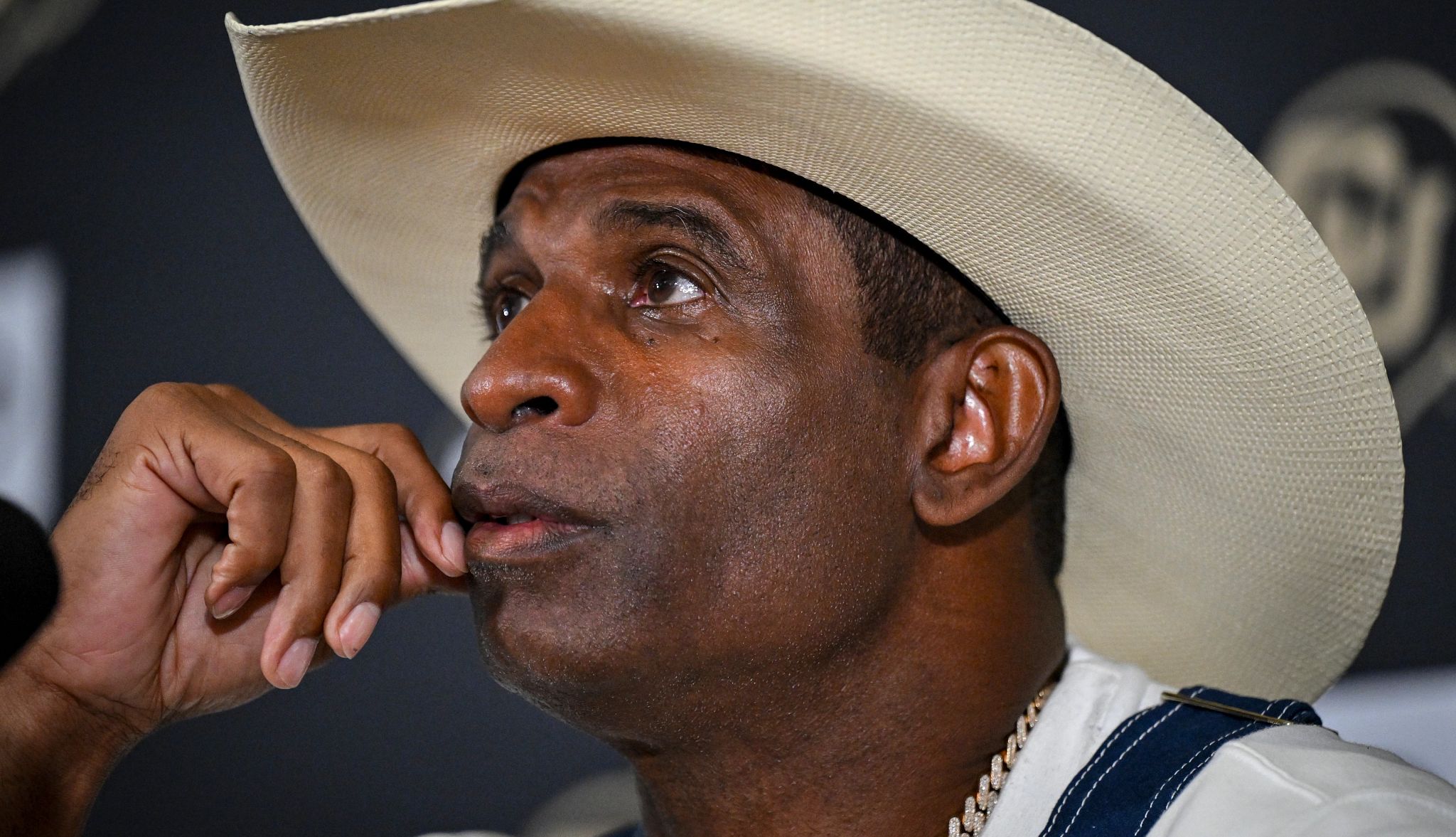 Deion Sanders Talks About Cancer Battle deion sanders wearing a wide-brimmed hat
