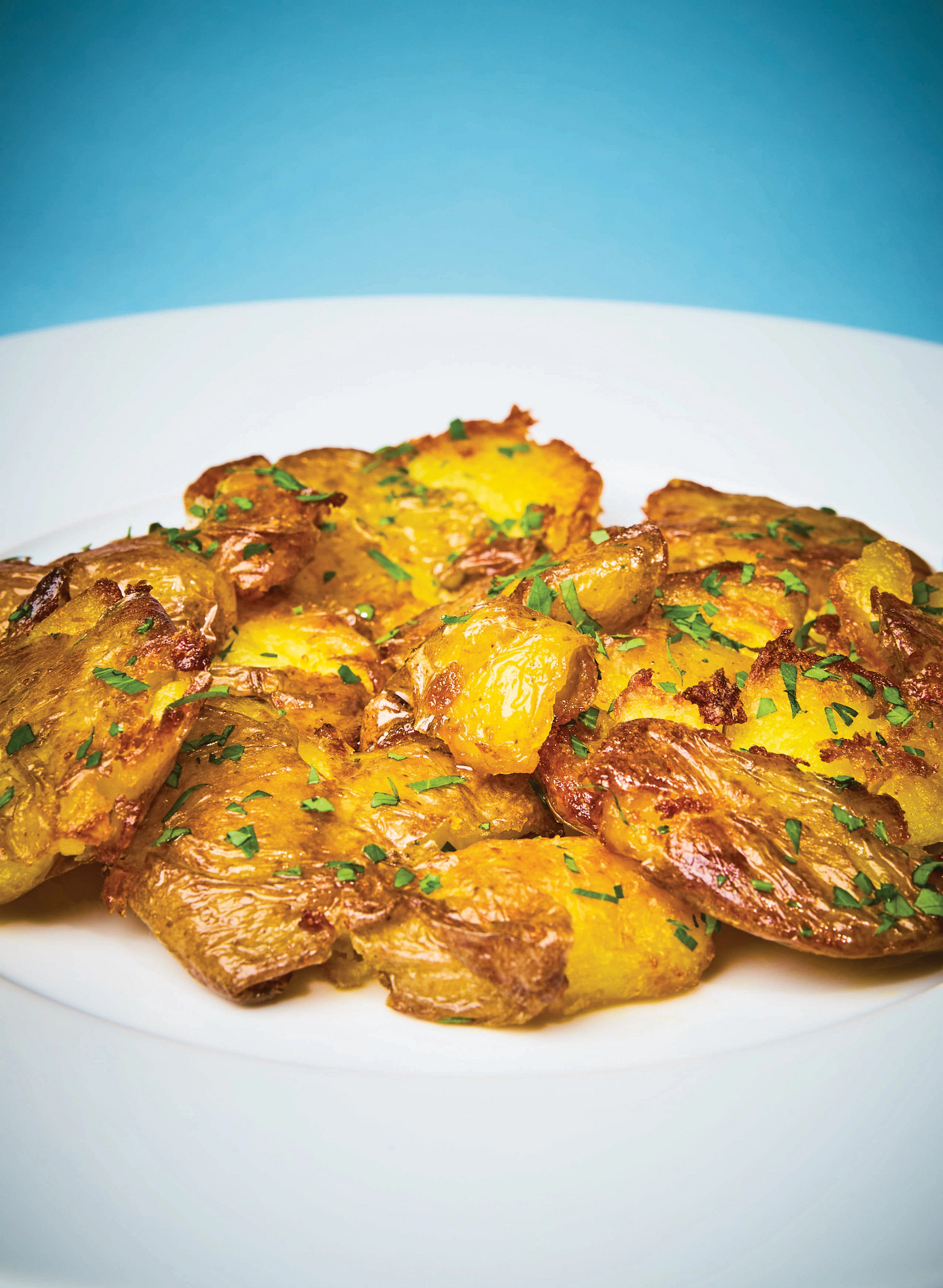 Eric Ripert’s crispy smashed potatoes are shown in extreme close-up
