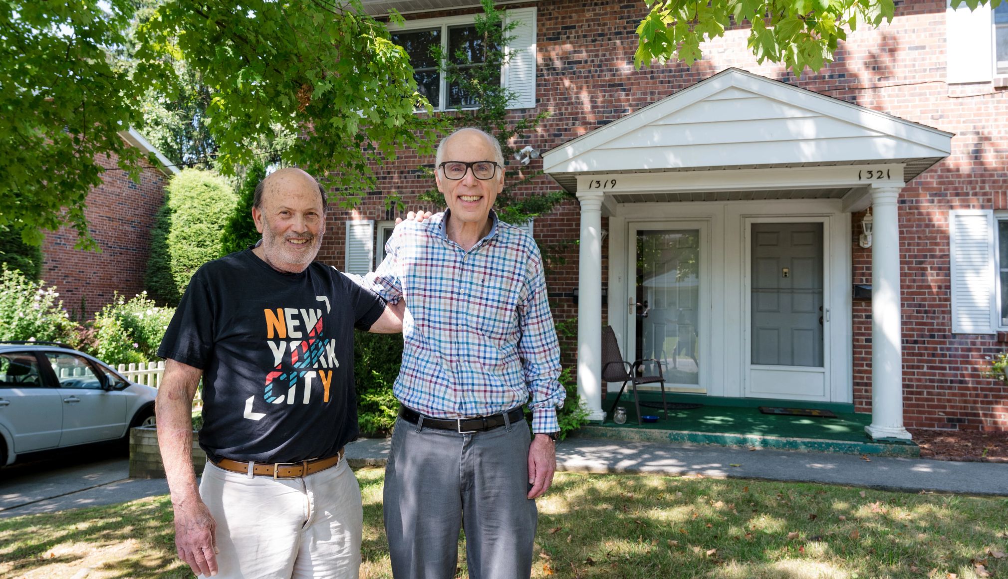 Barry Wendell and Joseph Hample in front of their home in Morgantown, West Virginia Barry Wendell and Joseph Hample standing outside in front of home