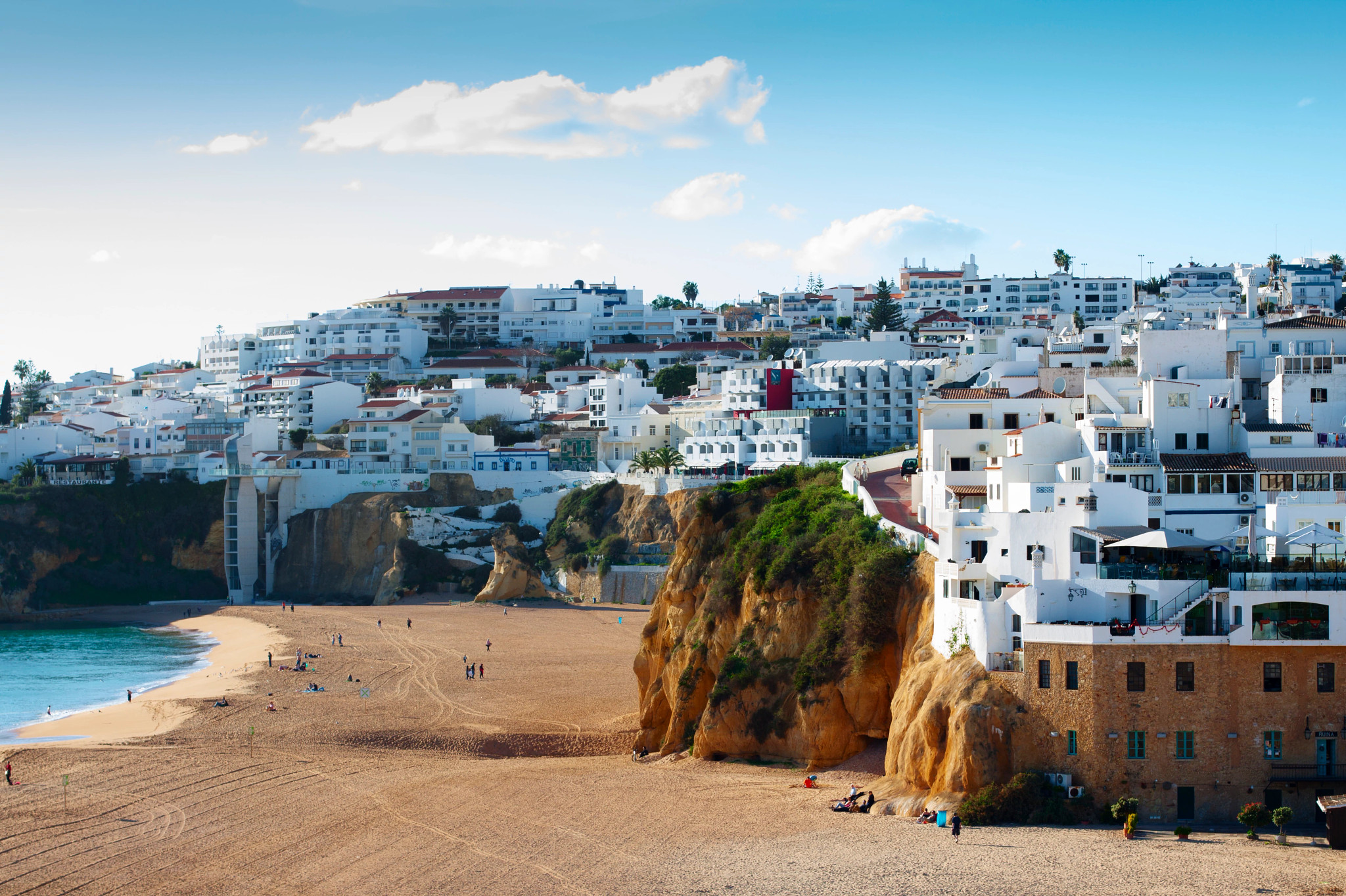 houses along a beach in Portugal’s Algarve region