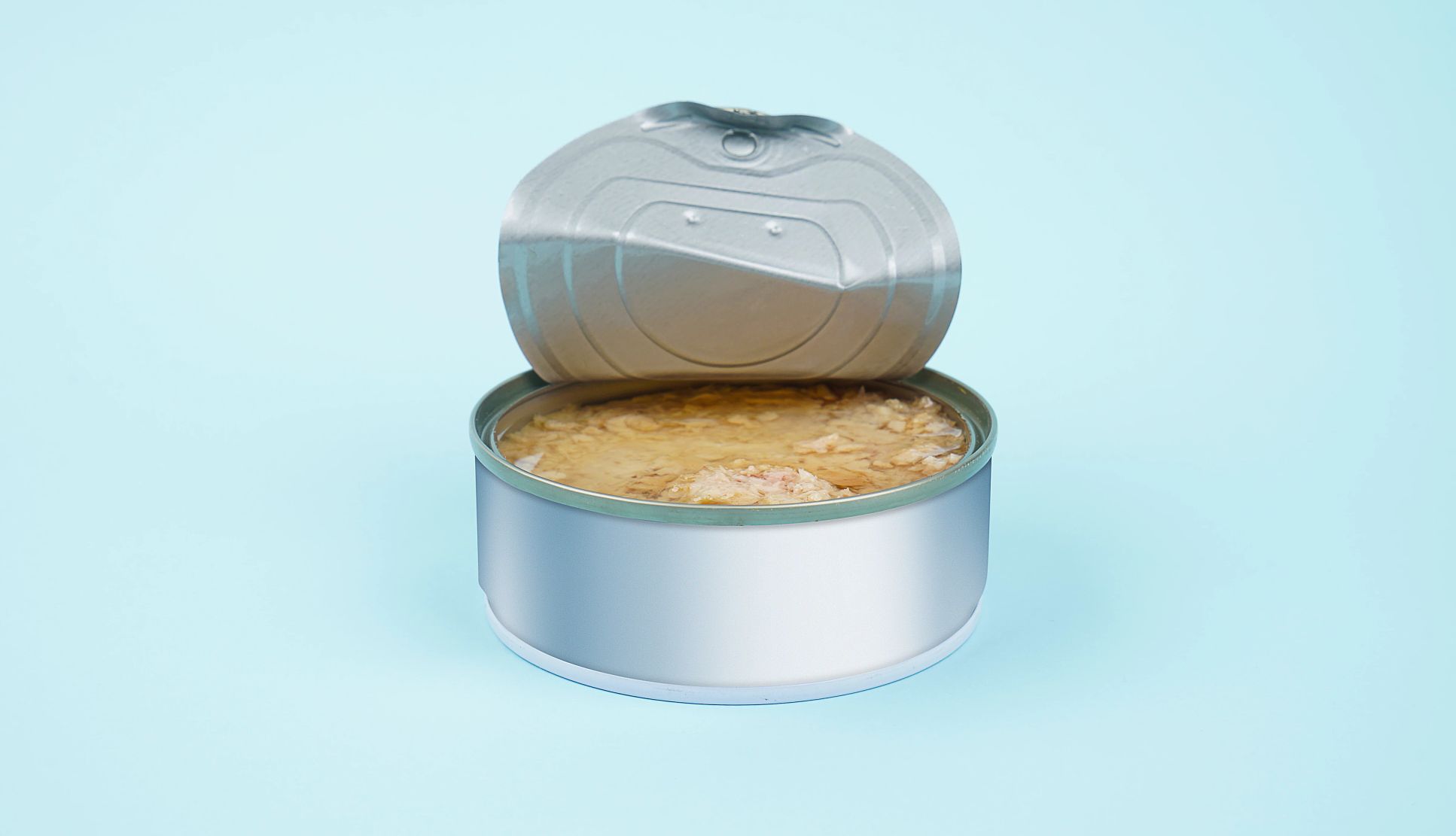 Canned Tuna Recalled canned tuna isolated on blue background