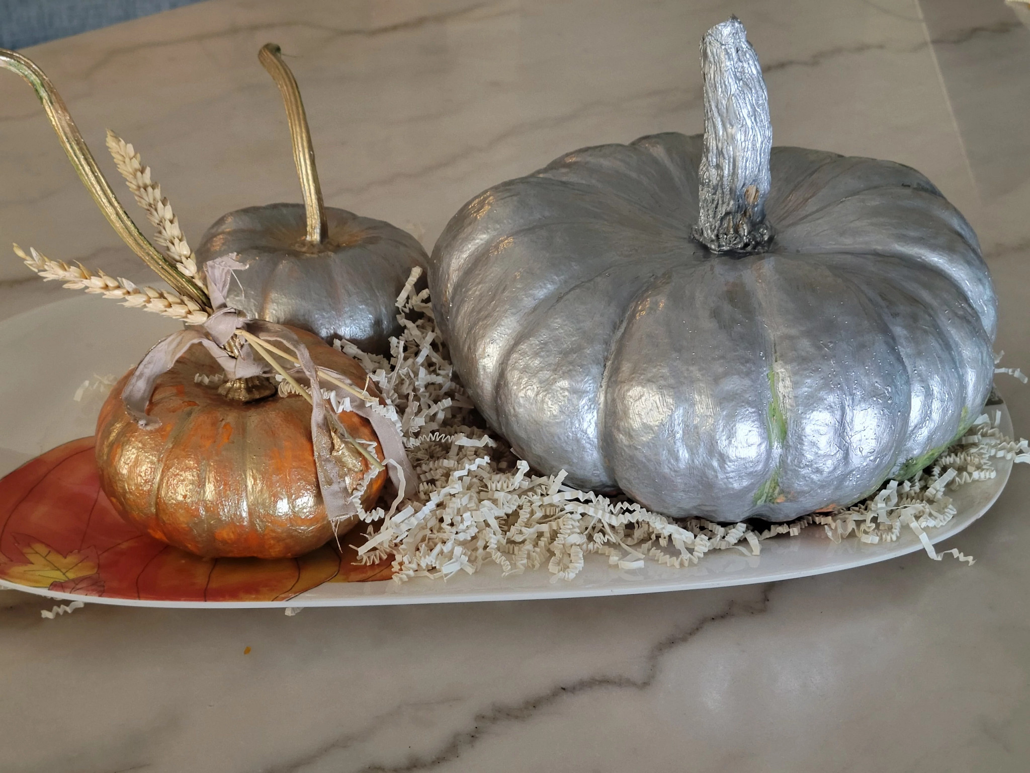 Halloween Decor on the Cheap painted pumpkins in various metallic colors