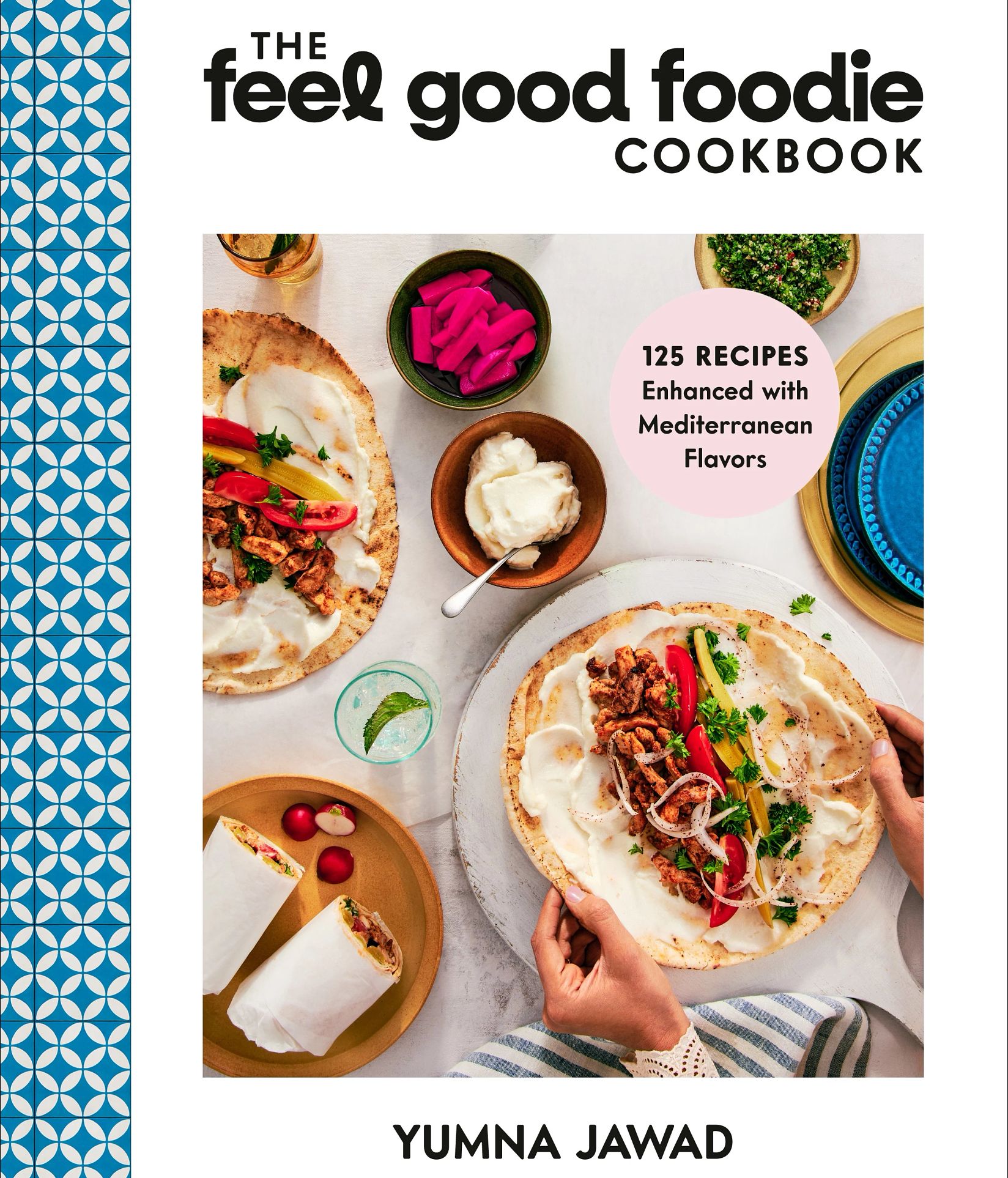Cookbook ‘The Feel Good Foodie Cookbook: 125 Recipes Enhanced With Mediterranean Flavors' by Yumna Jawad Cookbook that says The Feel Good Foodie Cookbook 125 Recipes Enhanced With Mediterranean Flavors, Yumna Jawad; plates and bowls with different foods on cover