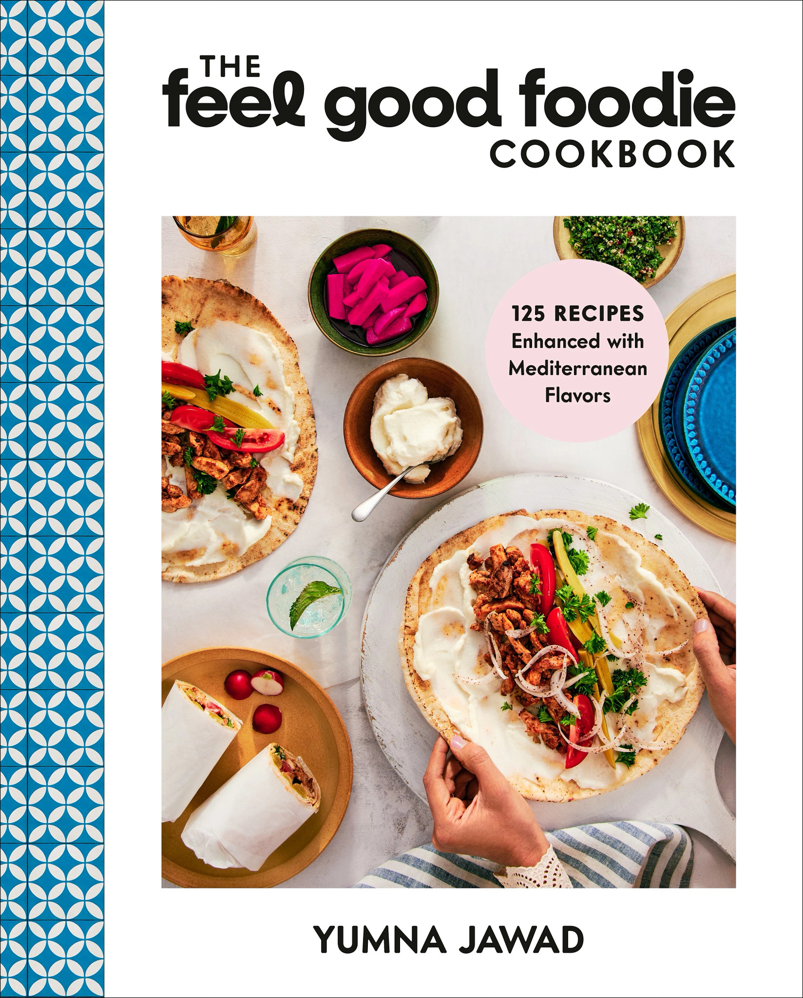 Cookbook that says The Feel Good Foodie Cookbook 125 Recipes Enhanced With Mediterranean Flavors, Yumna Jawad; plates and bowls with different foods on cover