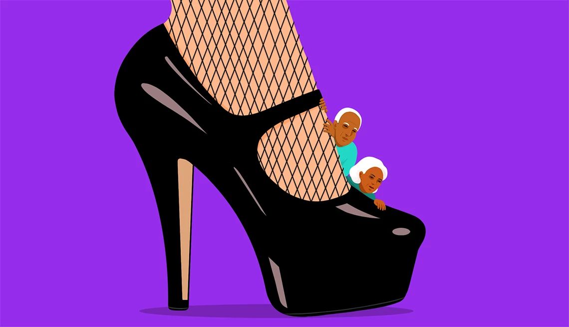 Explore Kink a foot wearing black heels with two people poking their heads around the side