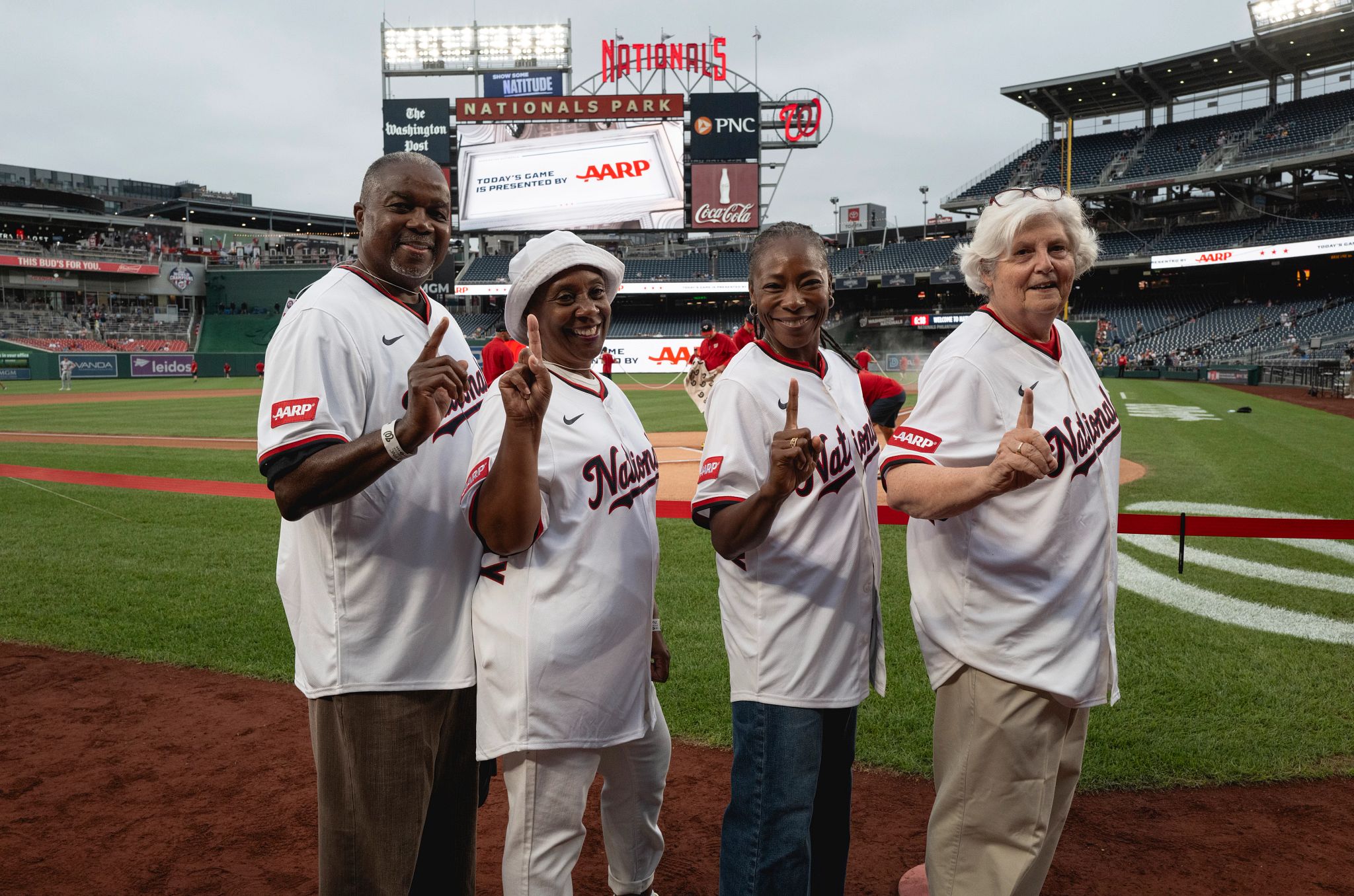 AARP Honors Social Security people posing for a group photo in baseball jerseys