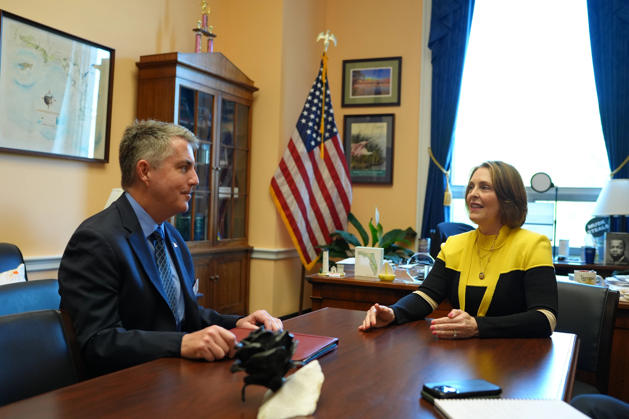 Jeff Johnson, state director for AARP Florida (at left), meets with Rep. Kathy Castor (D-FL).