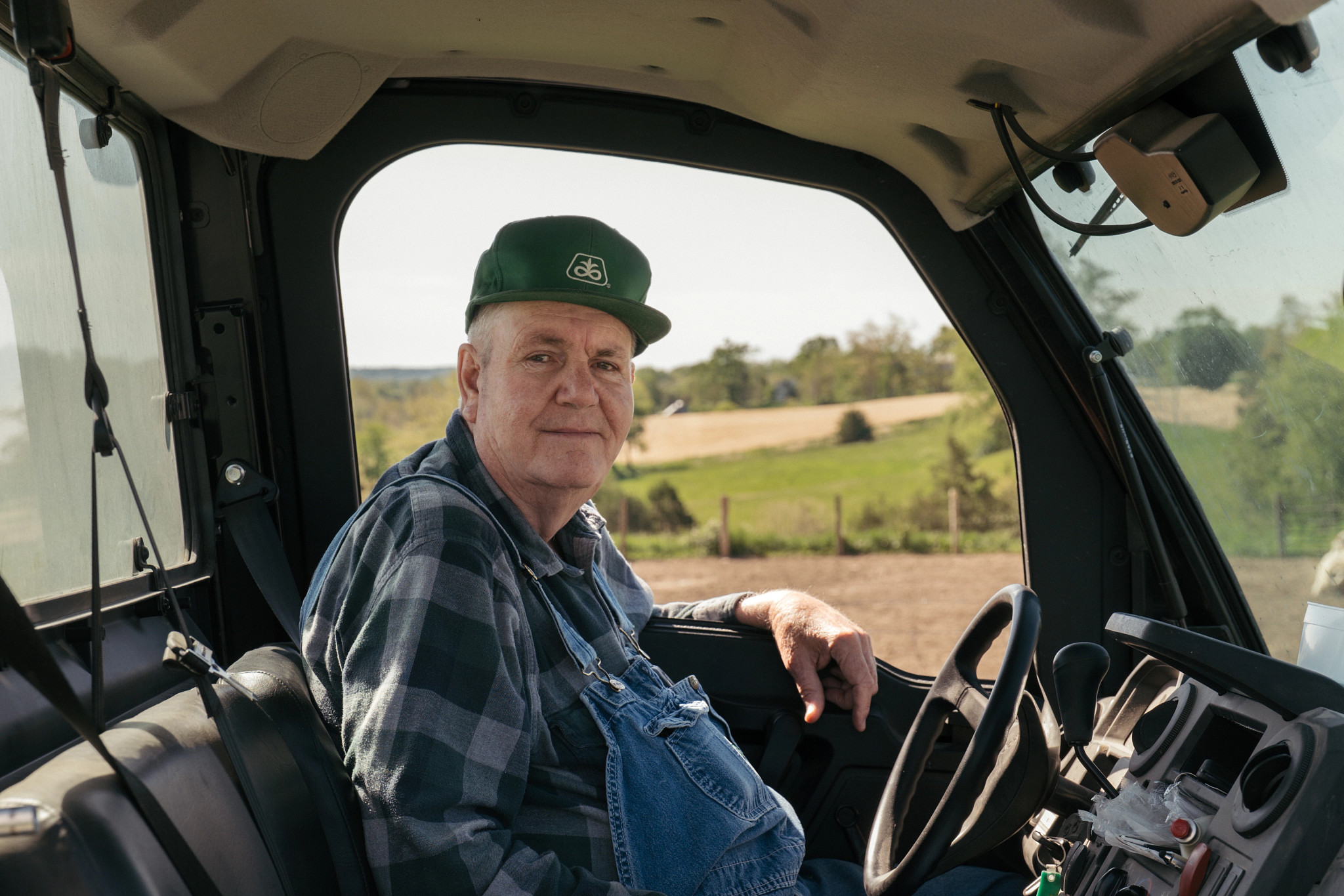 a farmer in a tractor