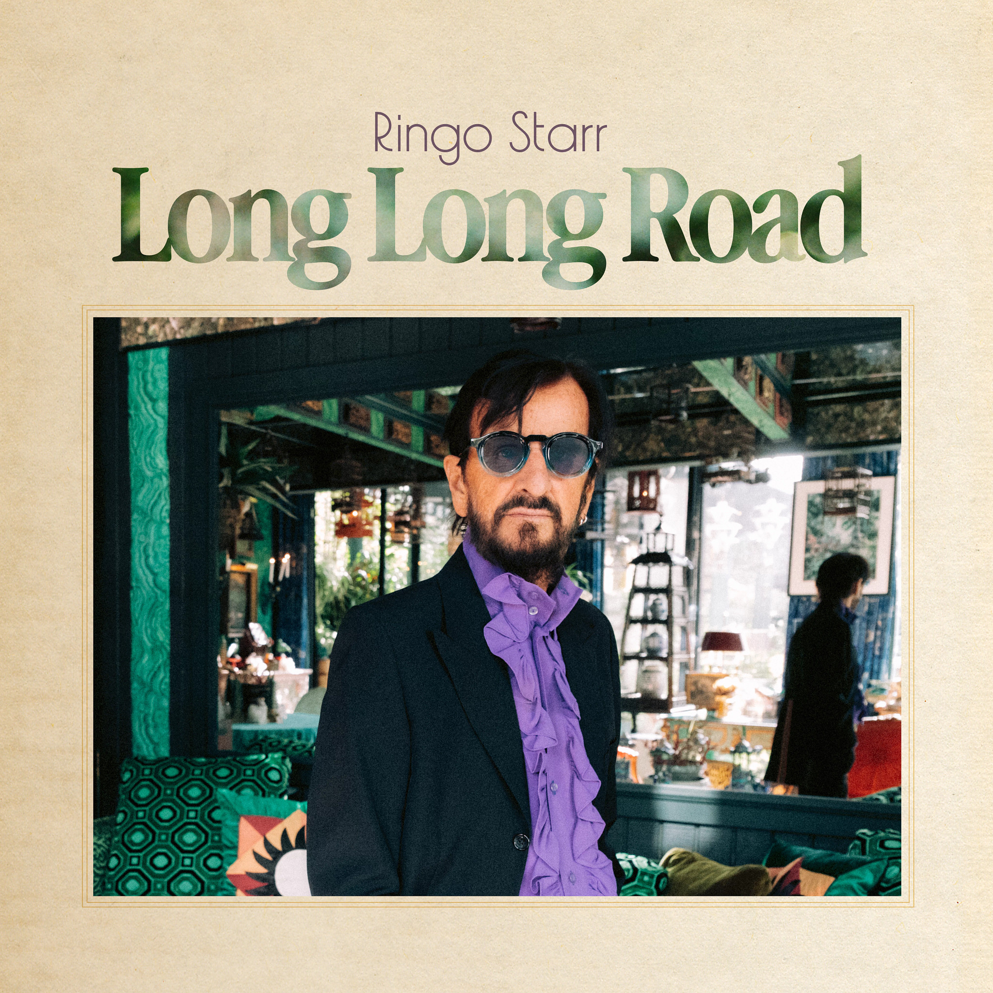 the cover of the ringo starr album long long road