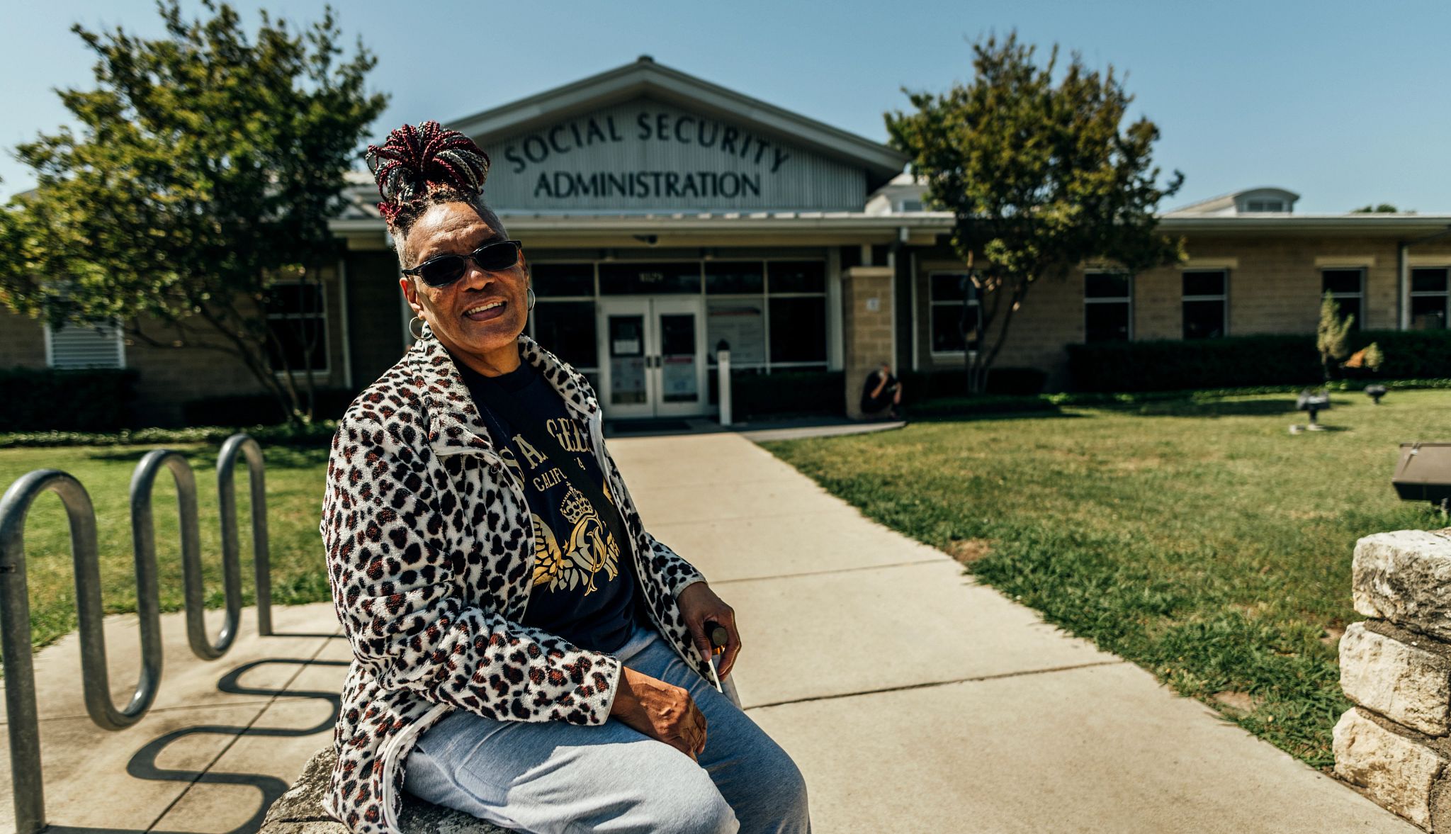 Social Security Offices Face Uncertainty a woman sits in front of a social security office