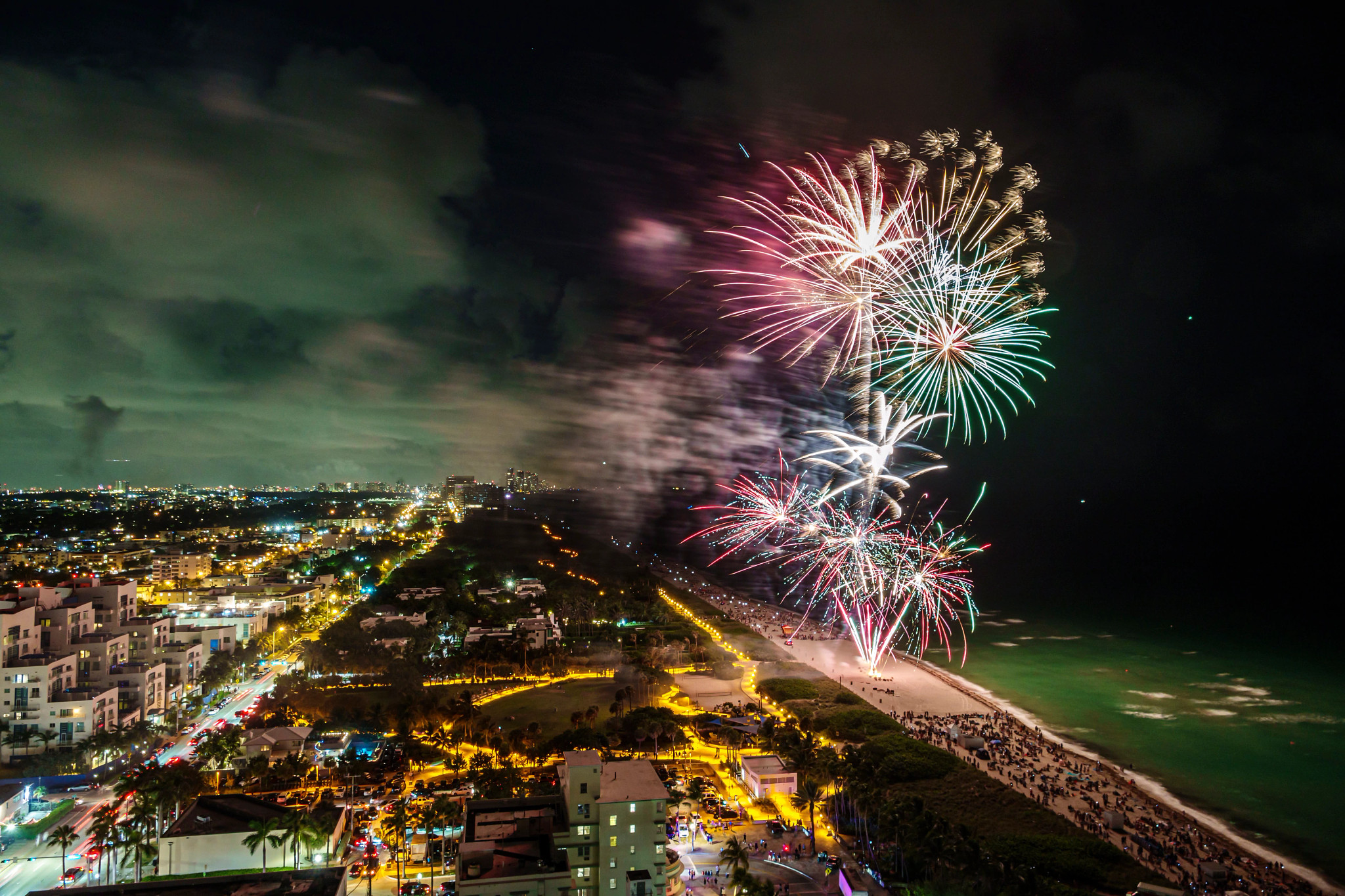 Fireworks explode at miami beach.