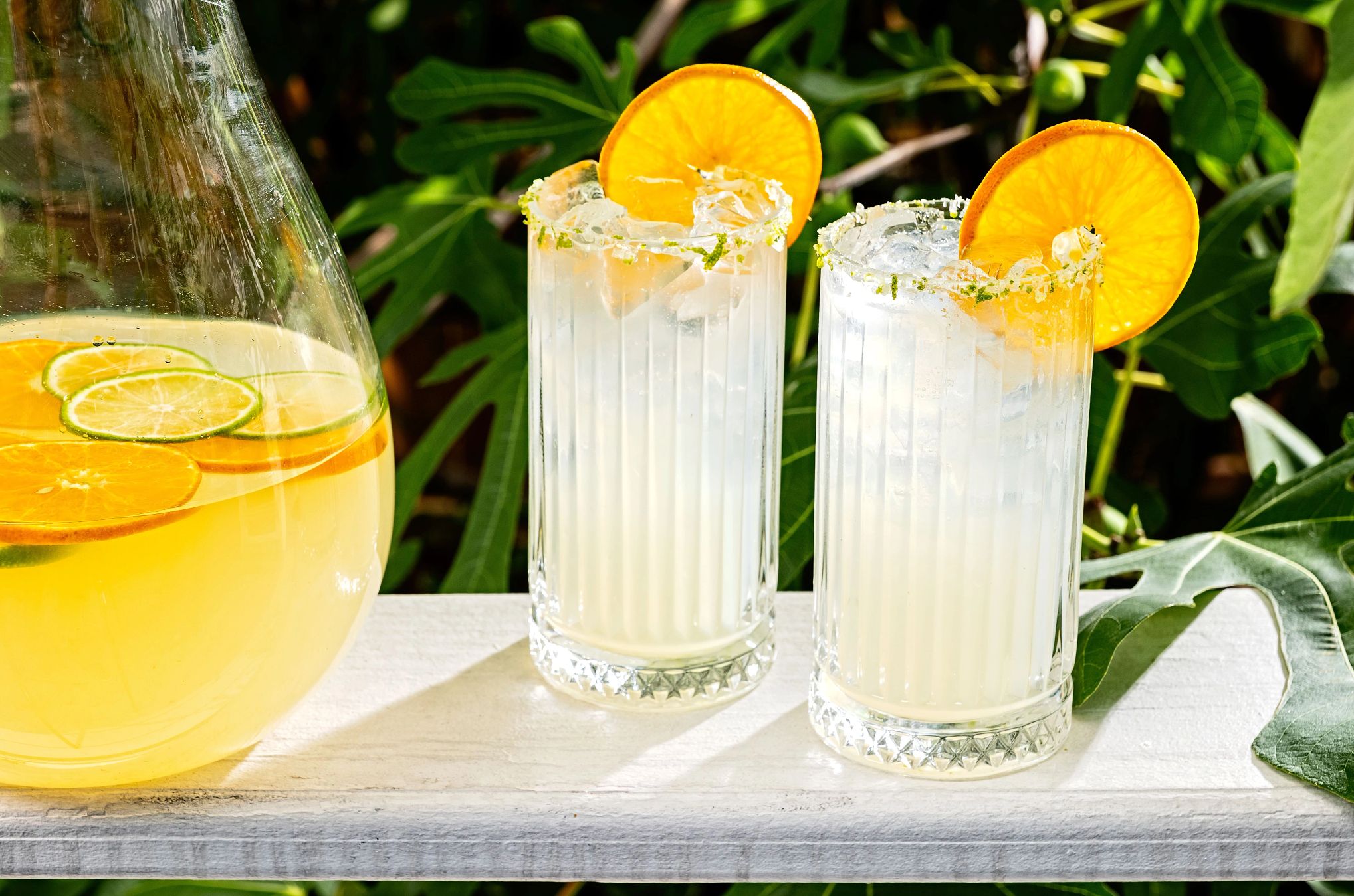A Classic Daiquiri is refreshing a pitcher and two glasses of Classic Daiquiri on a table