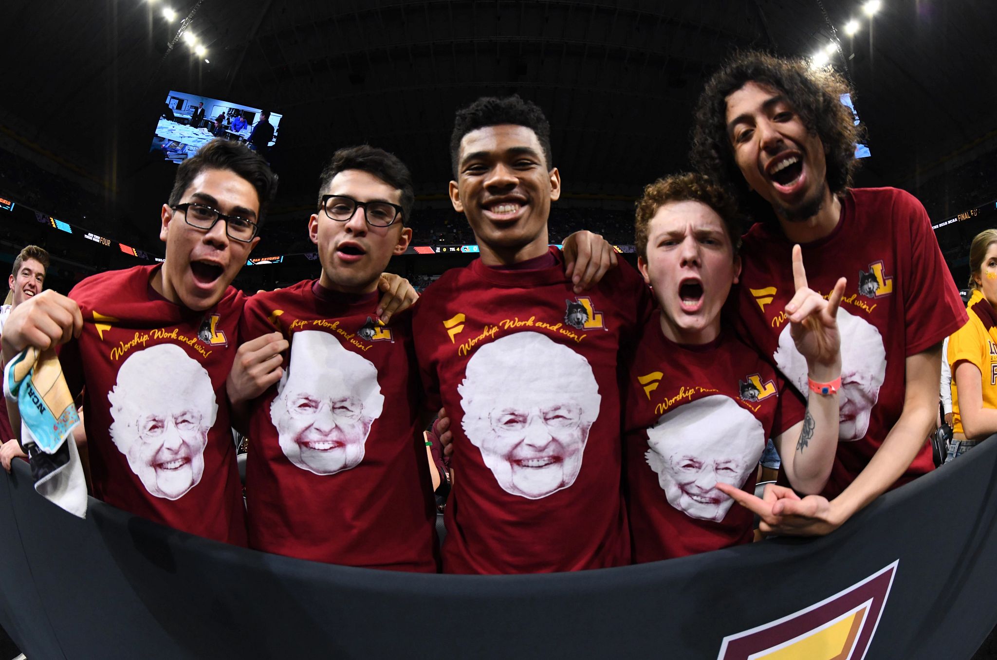 Sister Jean Dolores Schmidt Dies at 106 a group of loyola basketball fans wearing sister jean t shirts