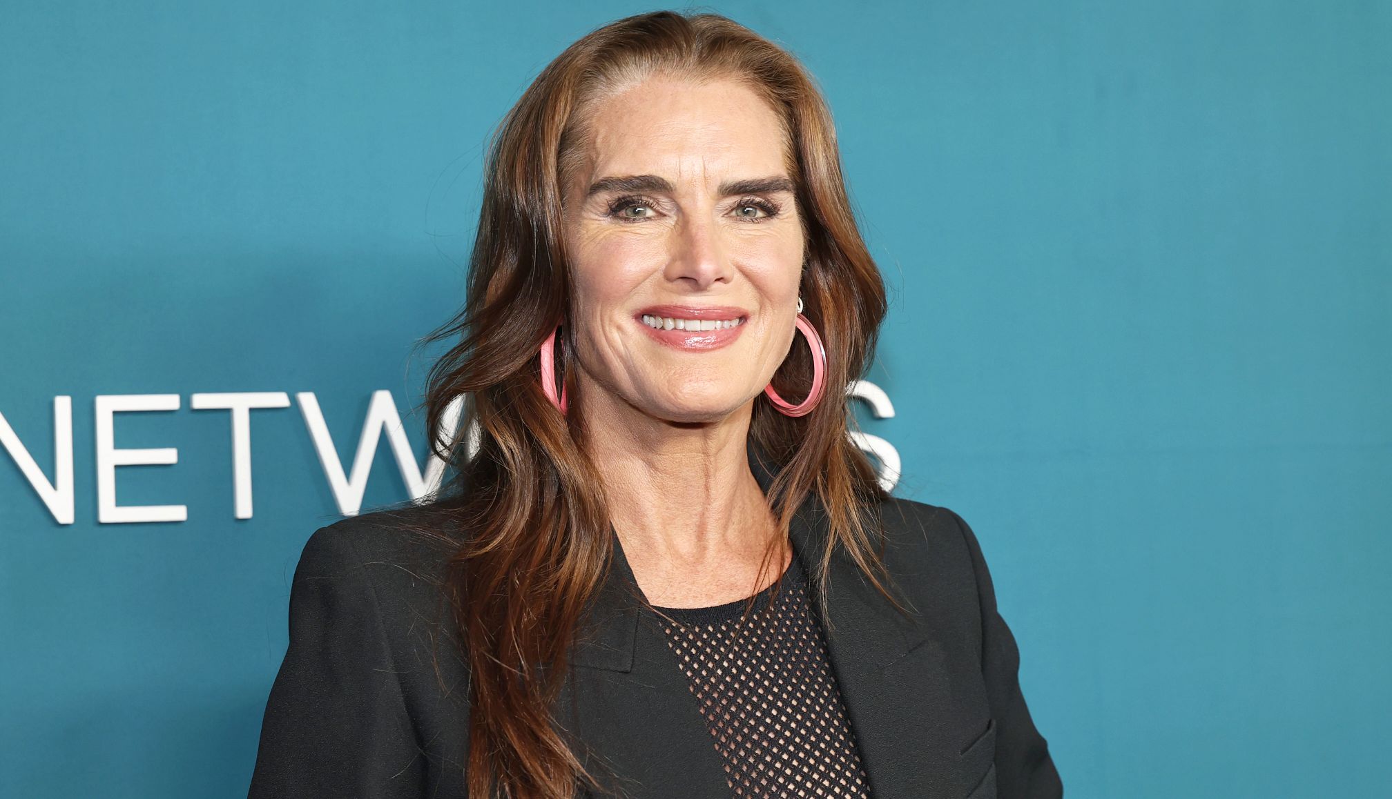 Brooke Shields Stuns in a Bikini for Her 60th Birthday Brooke Shields smiling for a red carpet photo
