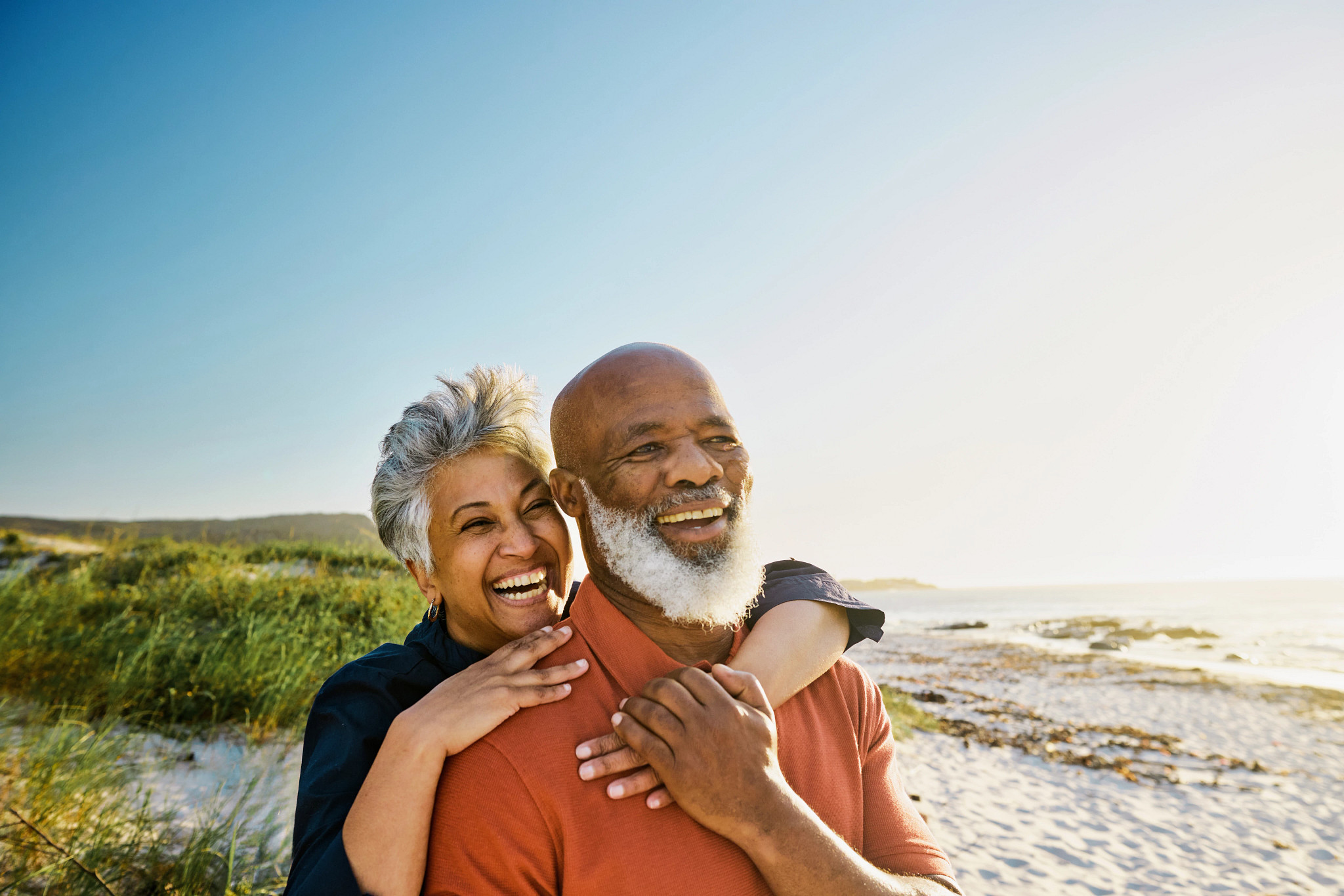  African-American Couple Enjoying Retirement and Each Other’s Company at the Beach.