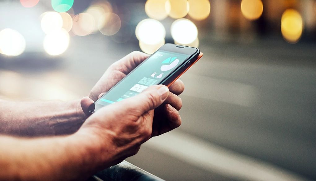 Our world today has an ever-increasing use of digital technologies A close-up view of a smartphone showing health data