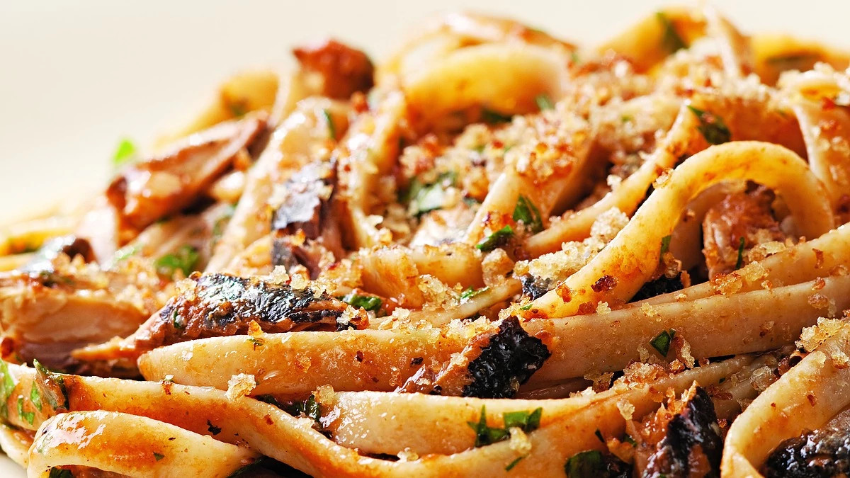 A close-up view of lemon-garlic sardine fettuccine