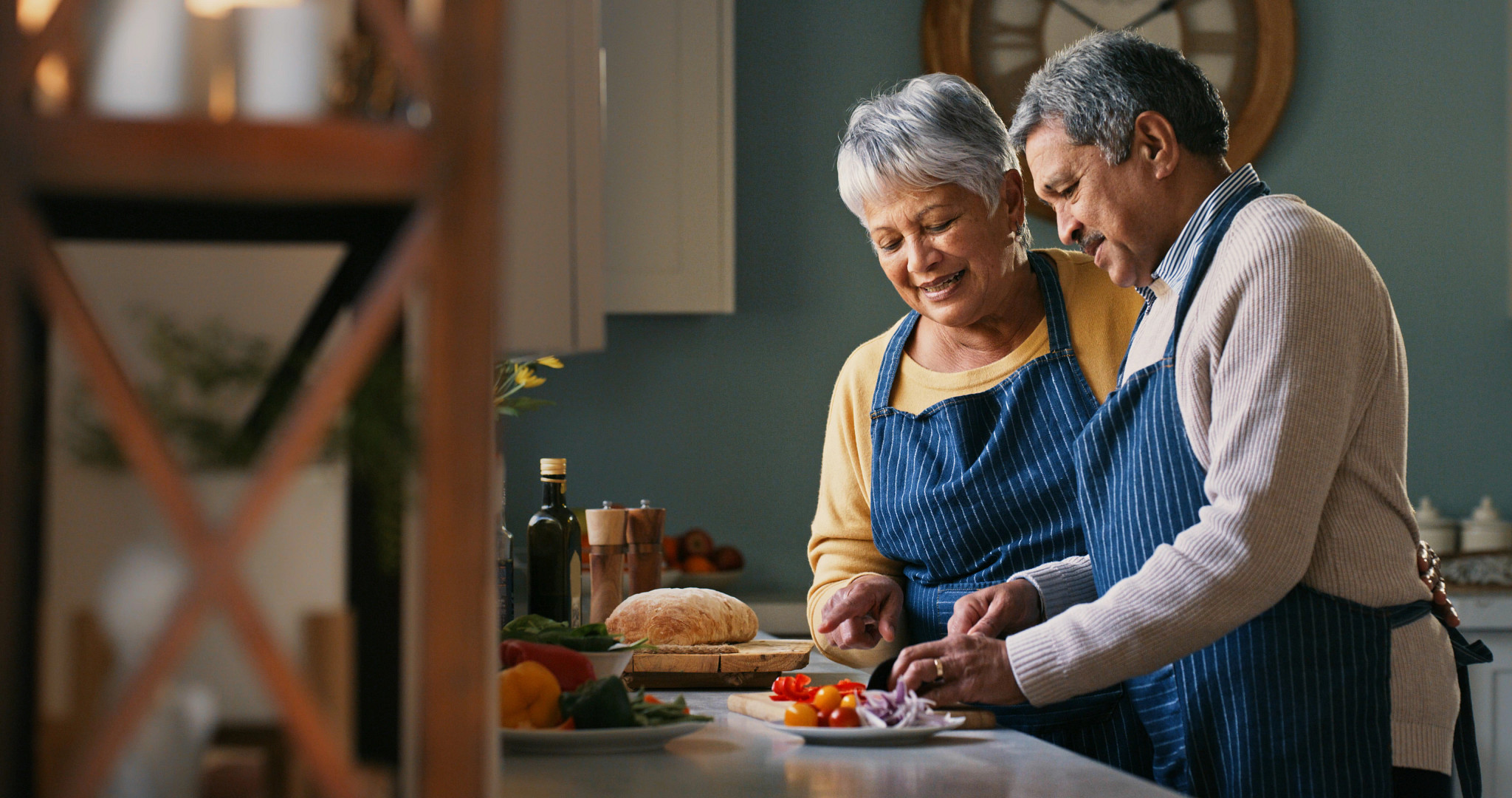Shot of a happy senior couple making a healthy meal at home