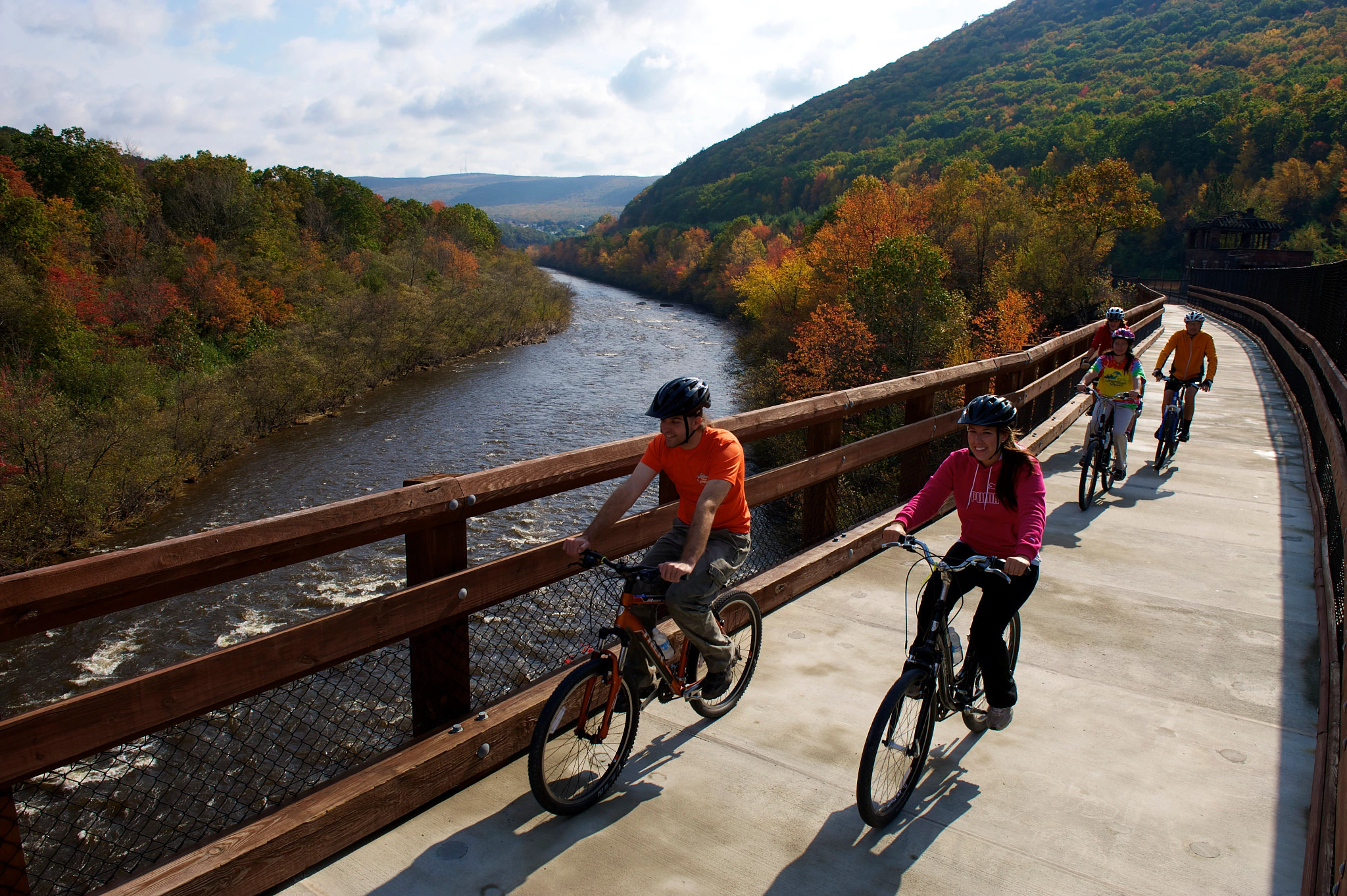 people riding bikes along a trails in the Poconos