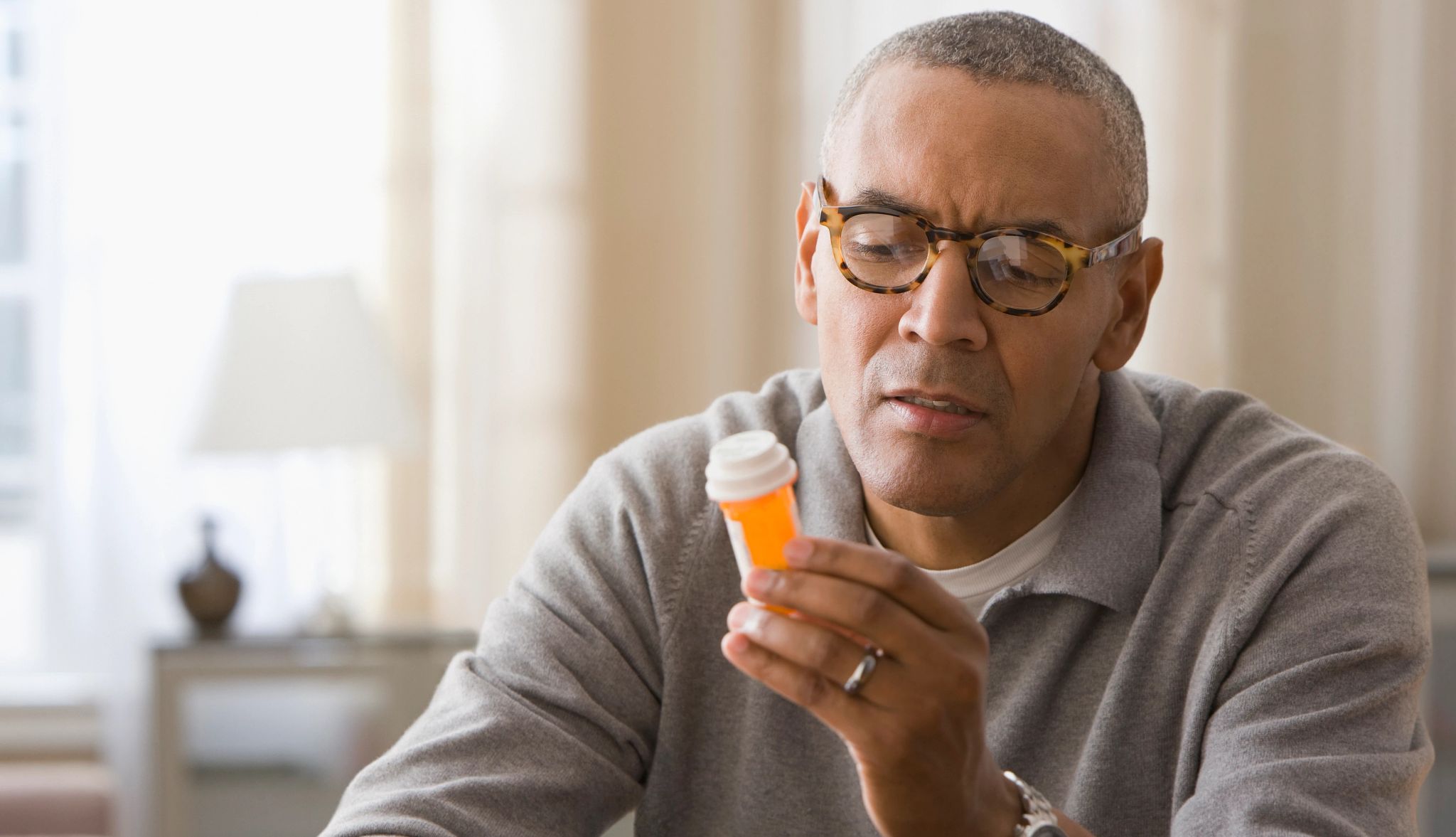 Smart Guide Liver Health man looking at his prescription