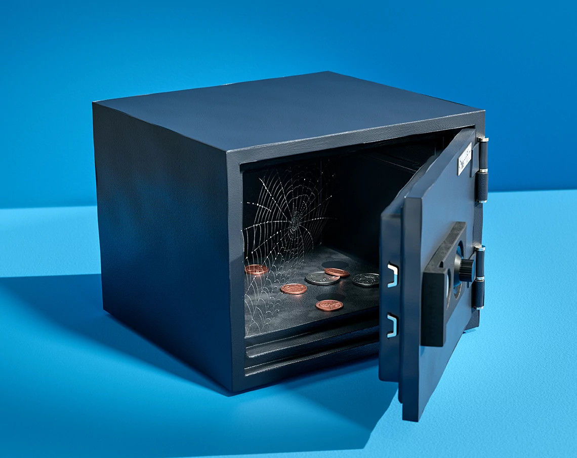 a safe with cobwebs in it