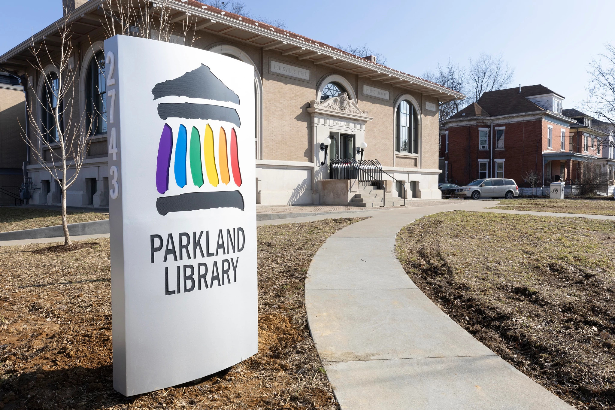 a sign outside a library