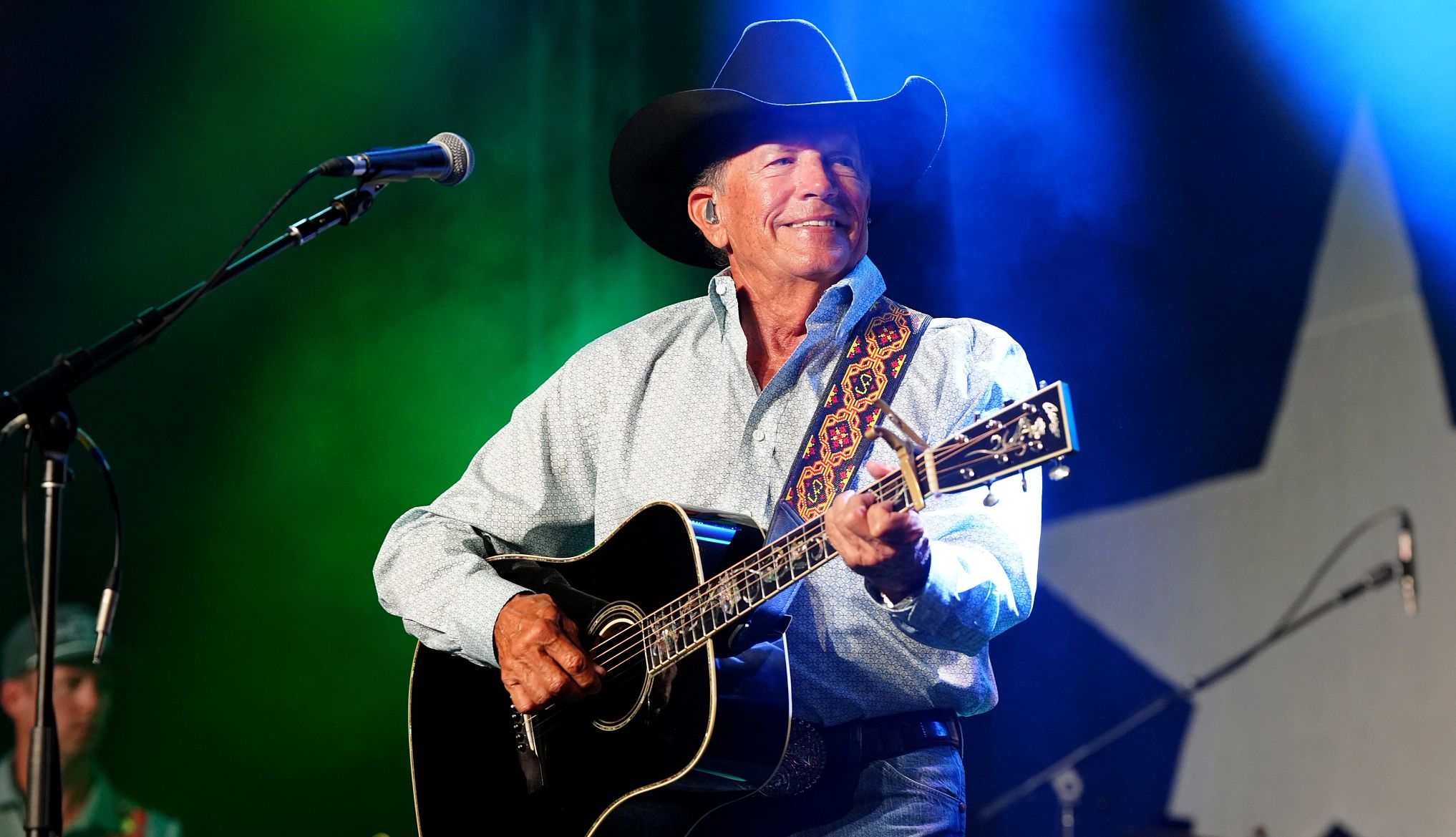 Trump Names Kennedy Center Honorees george strait performing onstage with a guitar