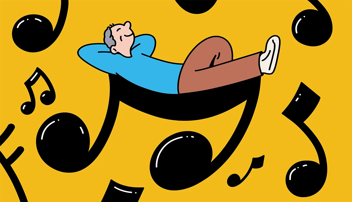 A man in a blue shirt and brown pants reclines on giant musical notes in front of an orange background