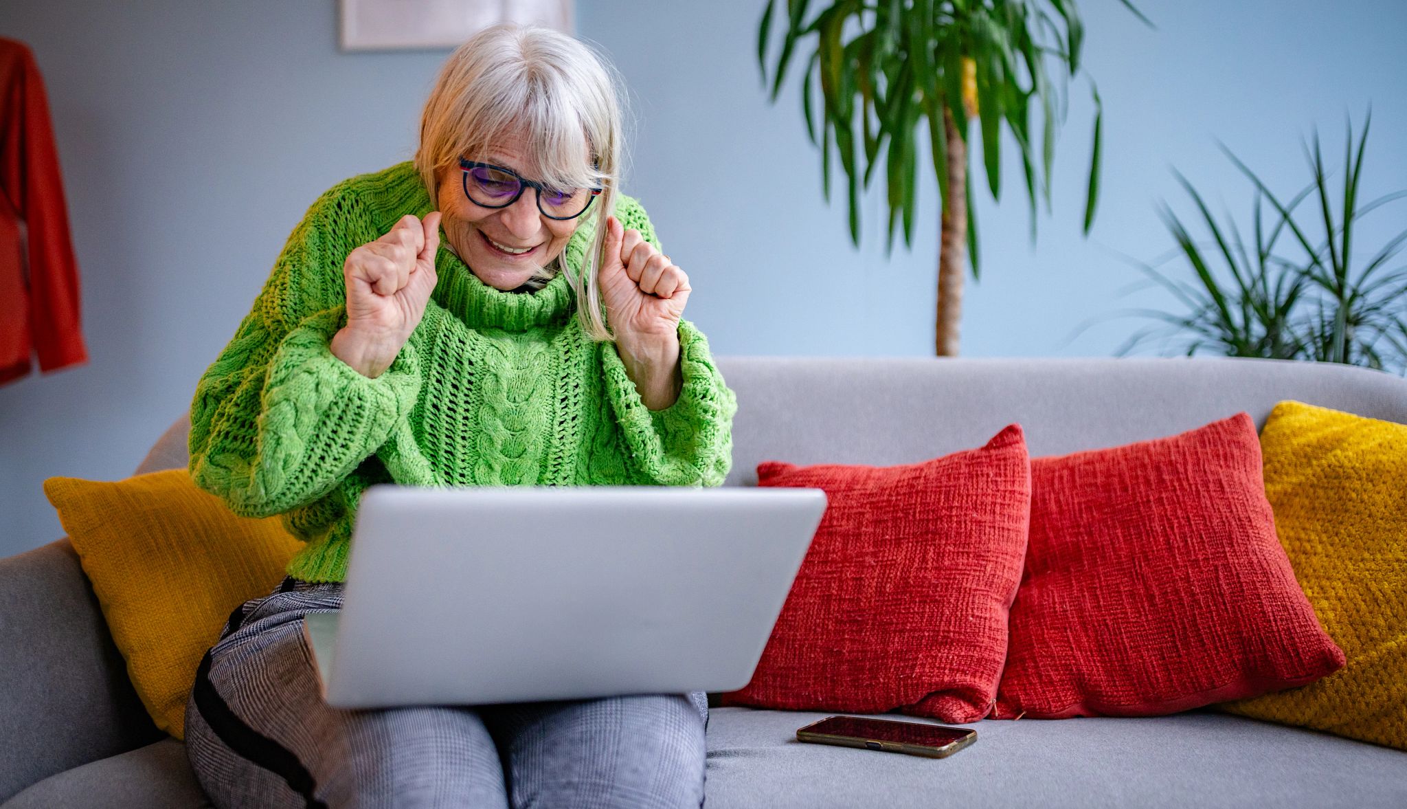 Mature Woman Running and listening to music on her smart phone. Mature Woman Running and listening to music on her smart phone.