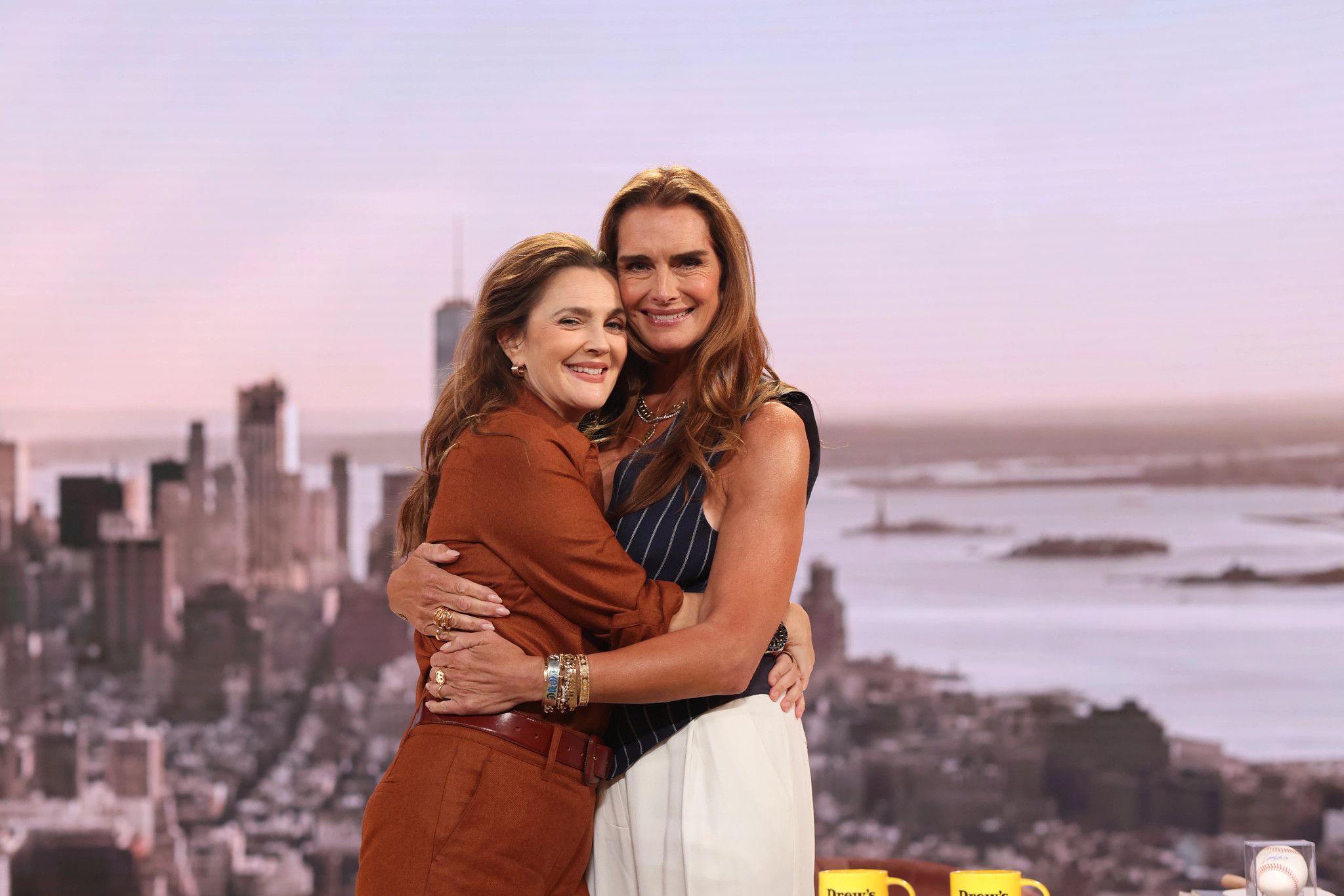 drew barrymore and brooke shields hug on the set of barrymore's talk show