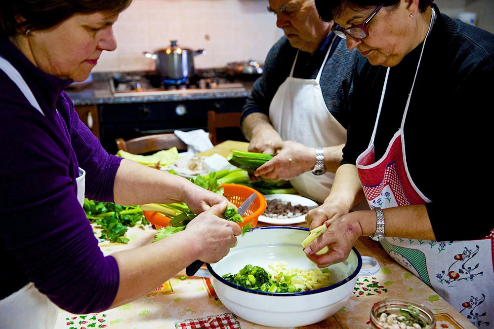 Older adults walking outdoors in a community setting.