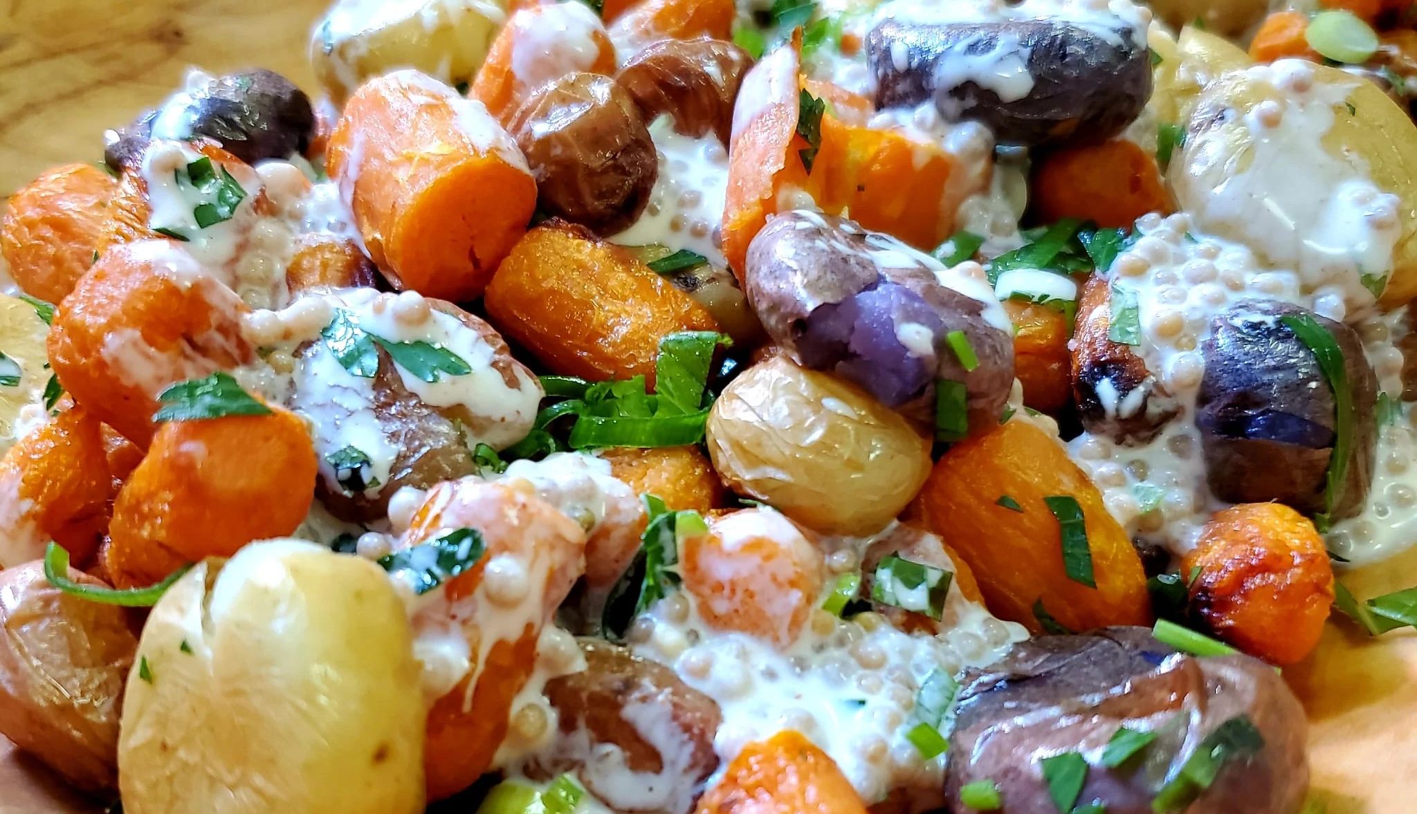Smashed Peewee Potatoes and Carrots Peewee potatoes and baby carrots in white sauce