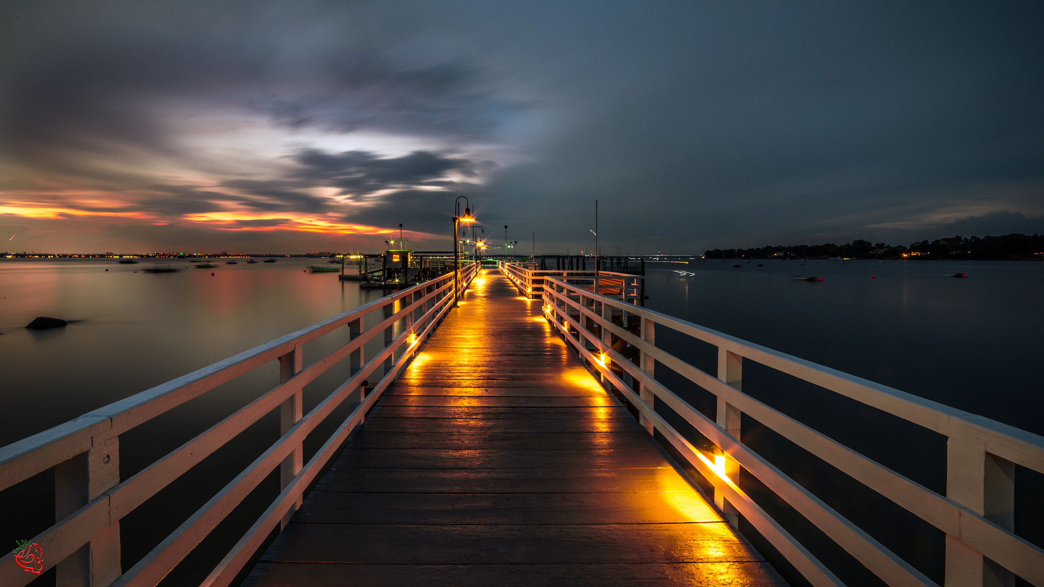 a photo shows a first-person view of an elongated dock in Great Neck Plaza, New York