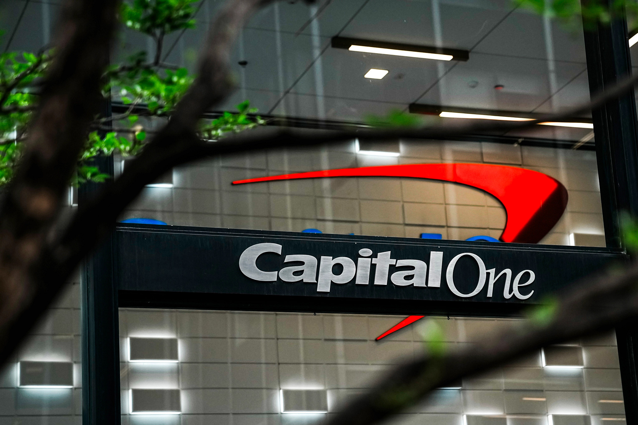 a capital one sign on the outside of a building