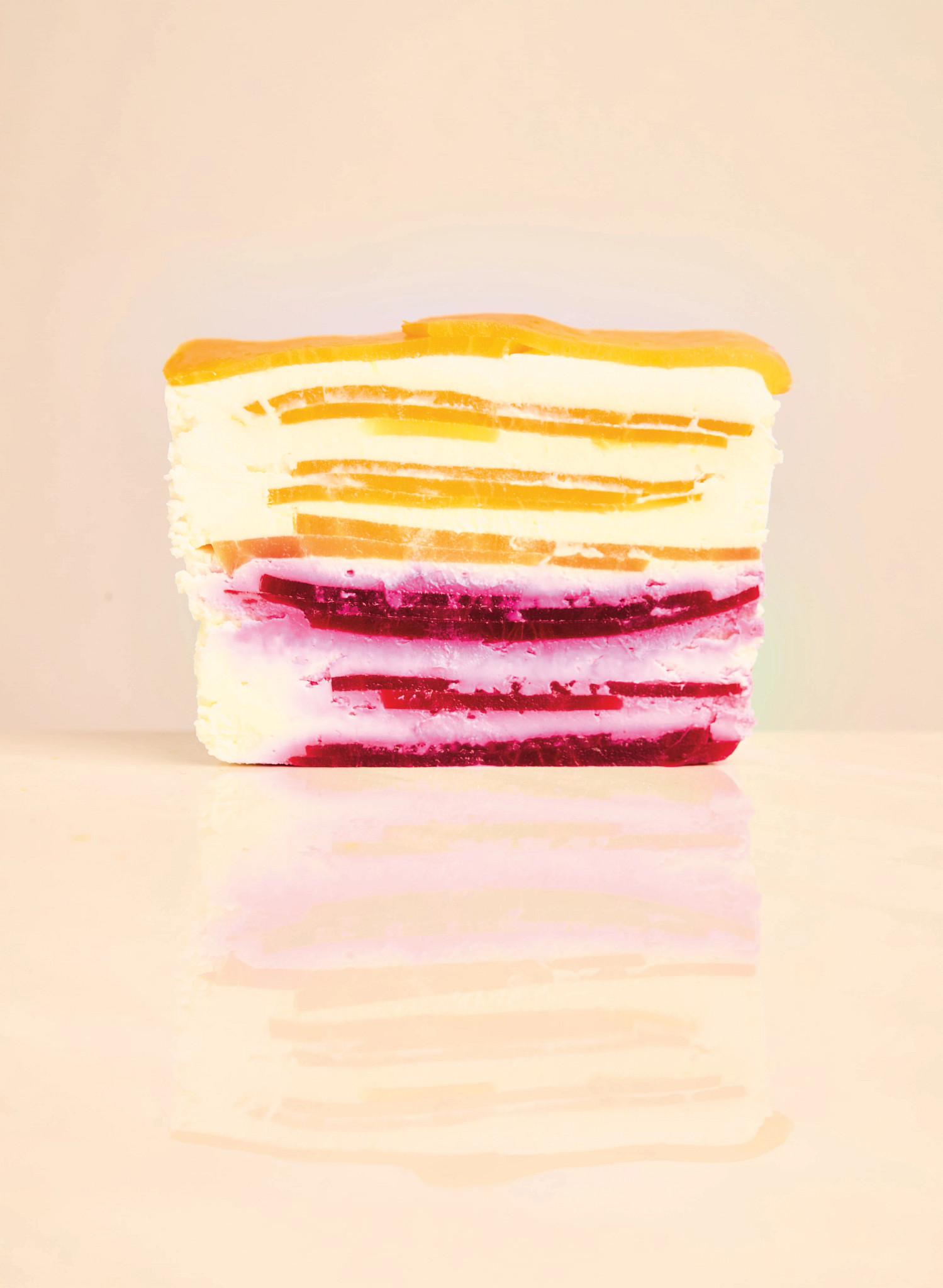 Eric Ripert’s colorful beet terrine in front of a peach background