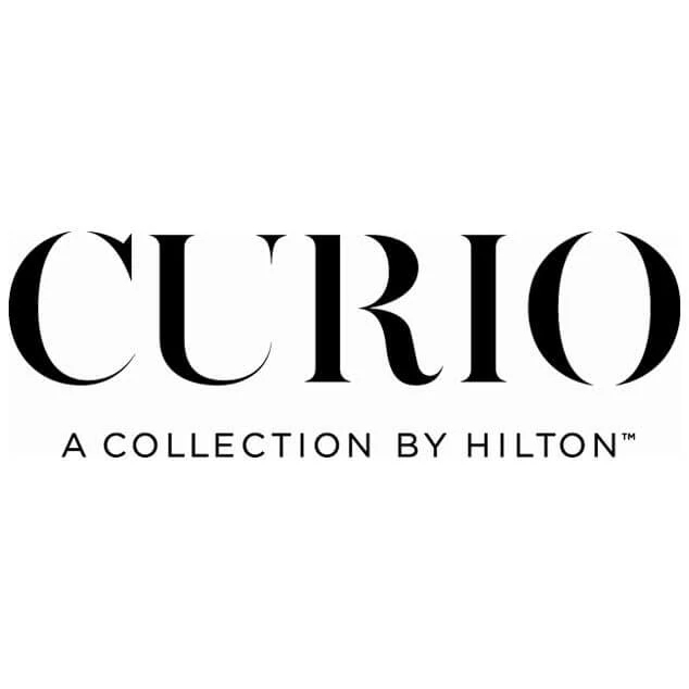 Curio Collection by Hilton™ logo in black lettering on white background