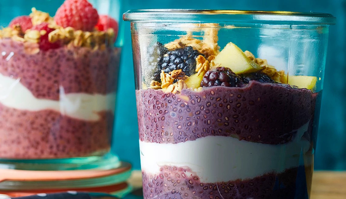 A close-up view of berry chia pudding in glasses