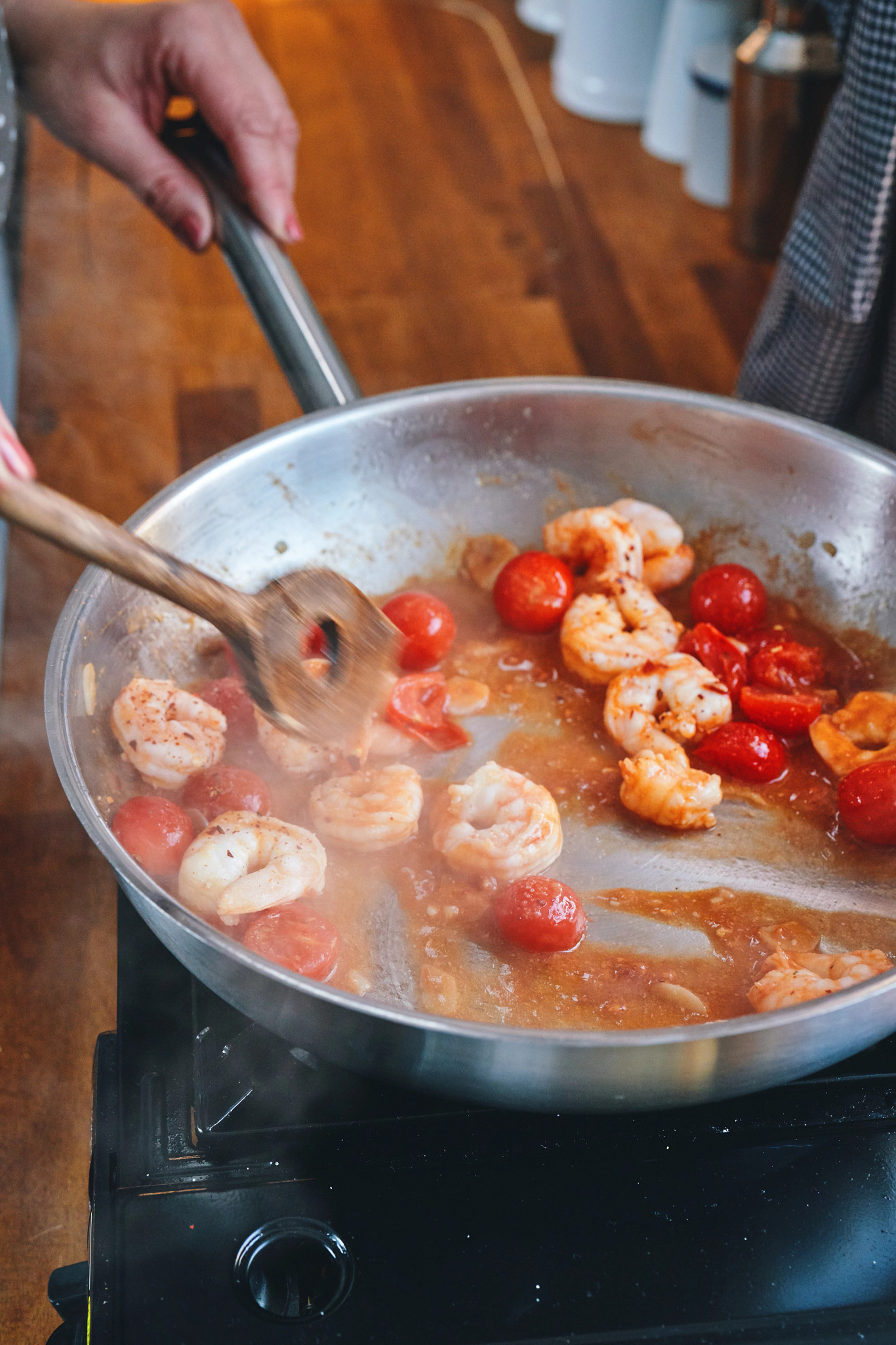 Image of shrimp cooking in a pan