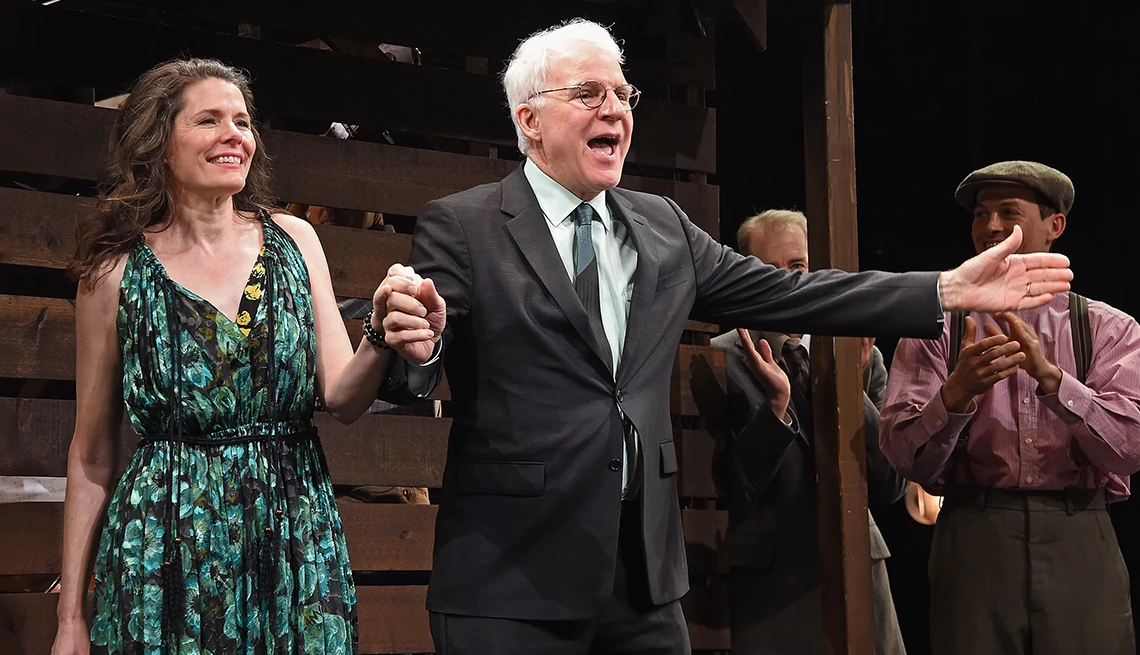 Edie Brickell and Steve Martin acknowledge the crowd during the curtain call of the Broadway musical Bright Star