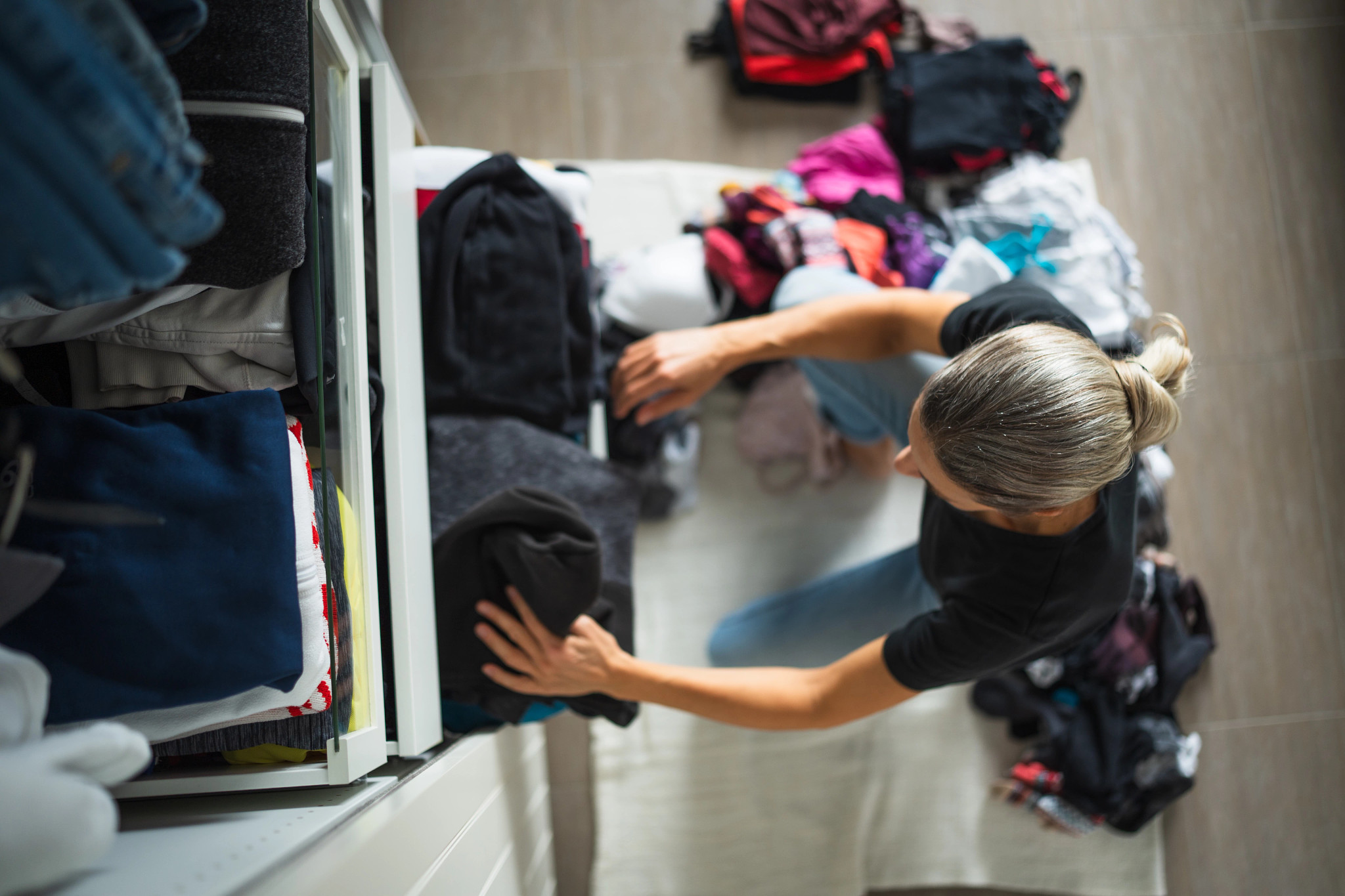 clothes being put away